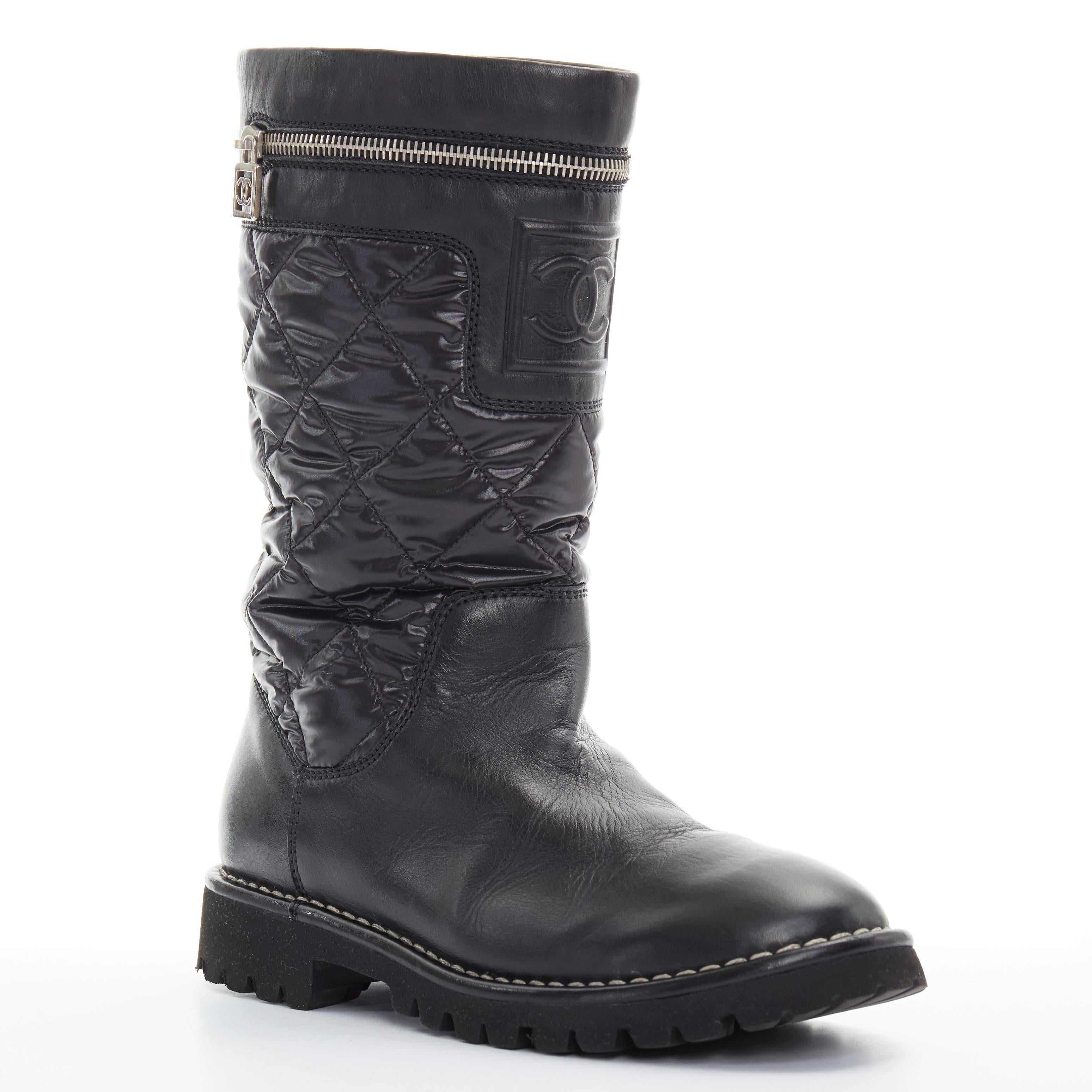 CHANEL Sports black diamond quilted nylon CC zip detail round toe calf boot EU36
Brand: Chanel
Designer: Karl Lagerfeld
Model Name / Style: Sport boot
Material: Leather
Color: Black
Pattern: Solid
Closure: Pull on
Extra Detail: Low (1-1.9 in) heel