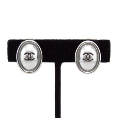 Chanel Spring 1999 Silver Oval CC Logo Earrings