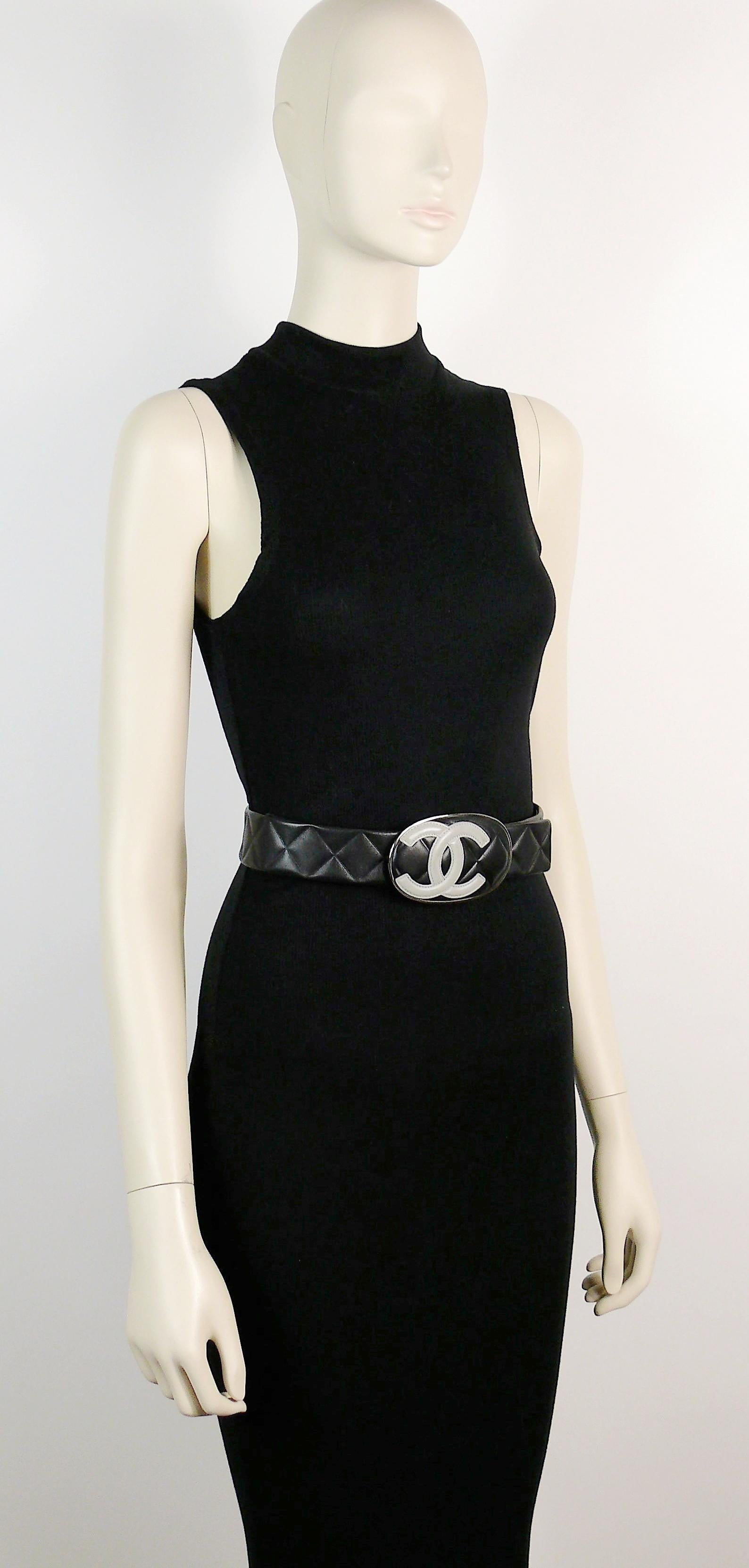 CHANEL black quilted leather wide belt featuring a large polished silver tone buckle with grey CC logo in the Cambon line style.

From the Spring/Summer 2005 ready-to-wear collection. 

Marked CHANEL 05 P Made in France.
Size 75/30.

Indicative