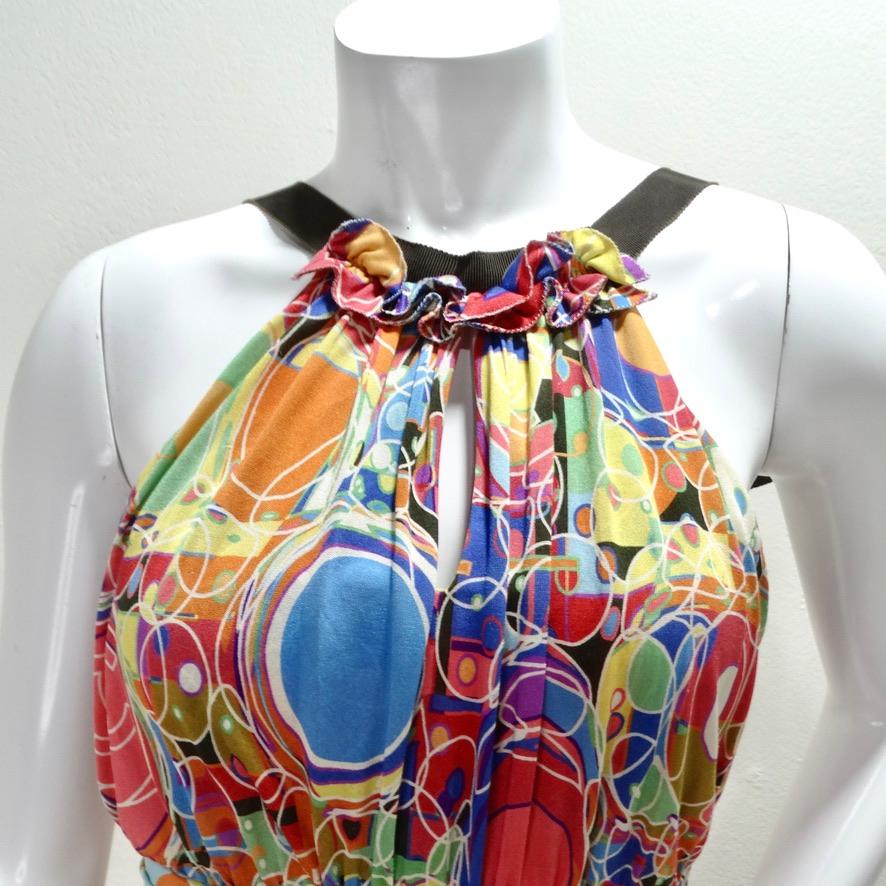Whimsical Chanel by Karl Lagerfeld 'CC' Silk Halter Dress! Circa Chanel's Spring 2008 collection, Karl Lagerfeld presents this stunning vibrant multicolor maxi dress! 100% silk jersey is adorned in an abstract pattern with signature Chanel 'CC'