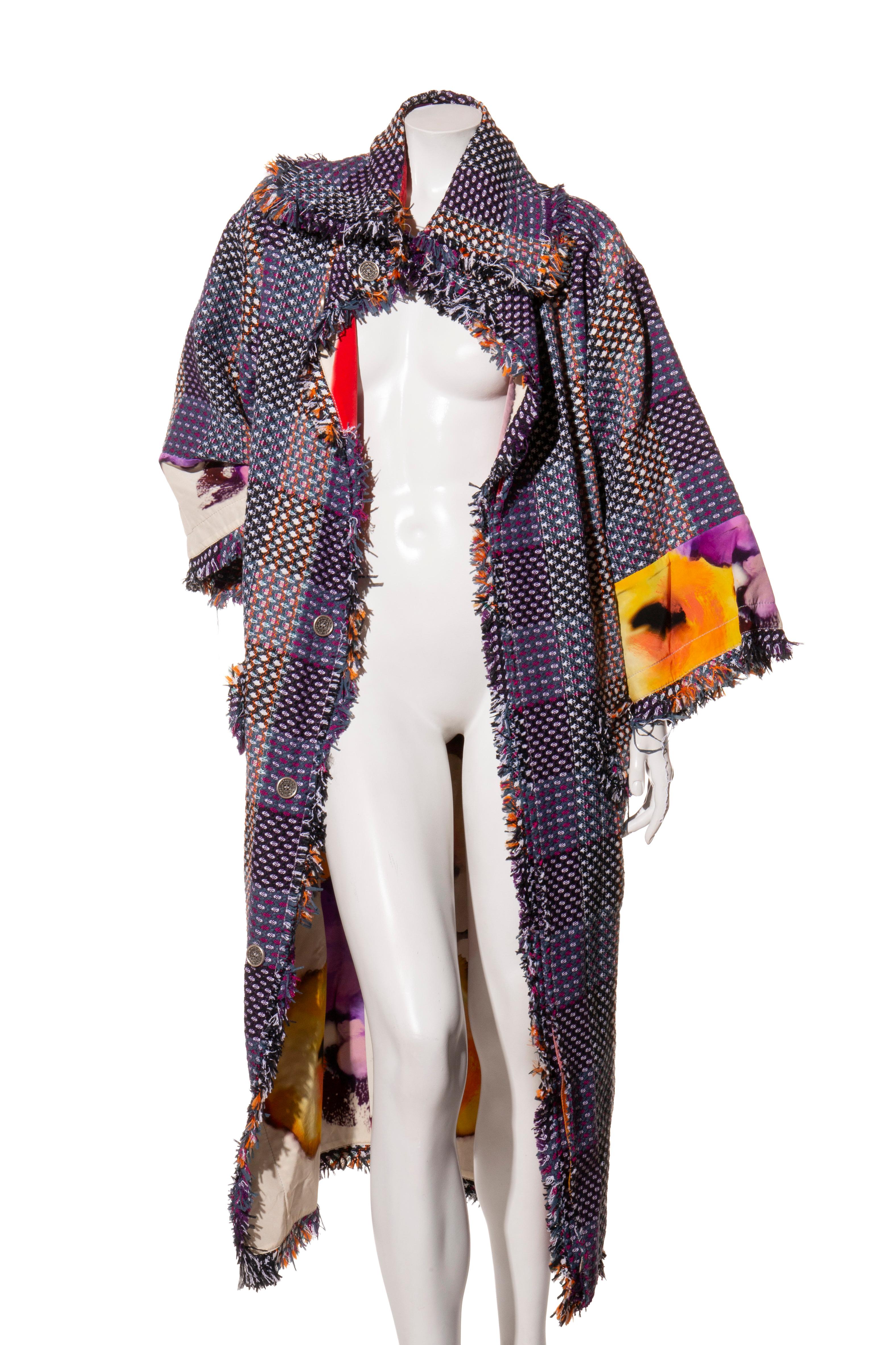 Chanel Spring/Summer 2015 Runway Reversible Crepe de Chine & Tweed Coat Size 36 (US 4)

From the coveted Chanel SS15 collection, this exceptional runway coat is a rare reversible design, offering two distinct looks in one. One side features a rich