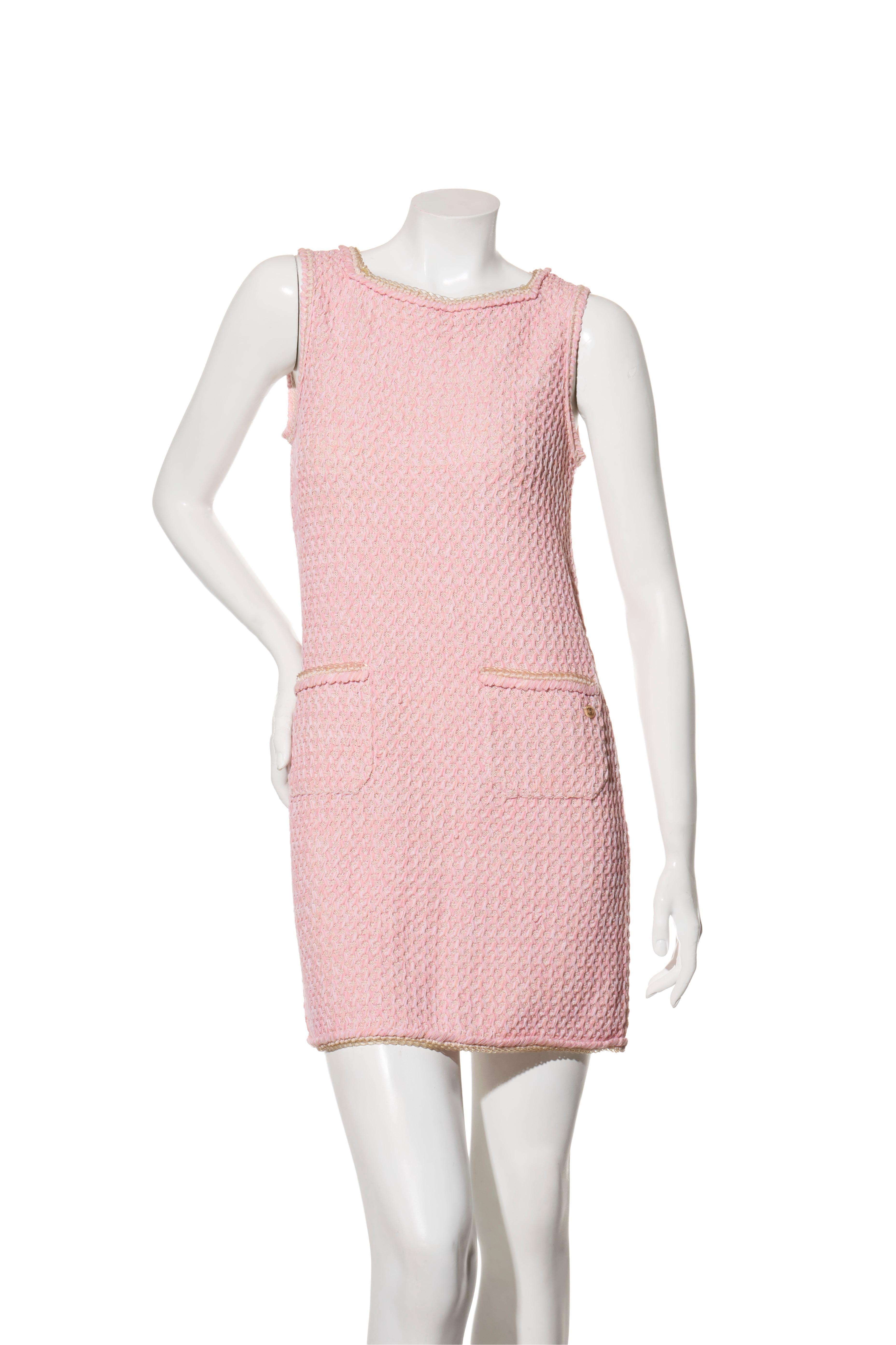 Chanel Pink Tweed Mini Dress, Spring/Summer 2017, Size 36 (US 4)

This rare Chanel dress from the Spring/Summer 2017 collection showcases the maison’s mastery of tweed in a soft pastel pink. Tailored in Italy, the sleeveless mini dress features a