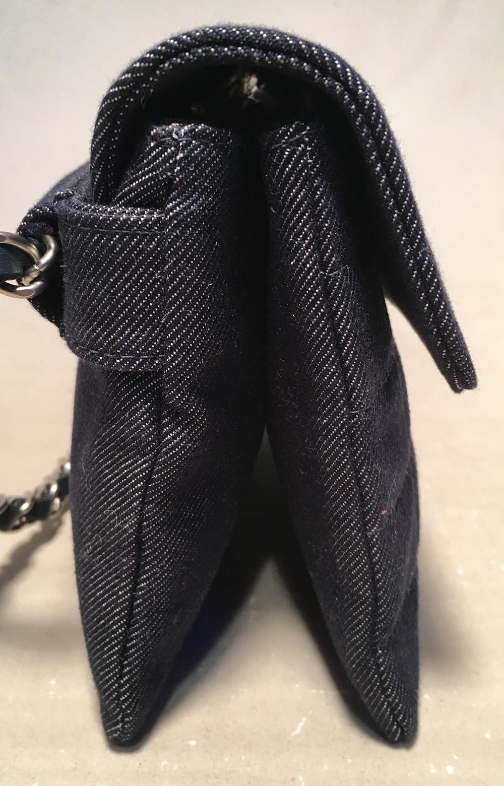 Chanel Square Quilted Denim Convertible Bum Bag Waist Pouch Clutch Shoulder Bag in excellent condition. Square quilted denim exterior trimmed with matte silver hardware. Woven chain and leather chain strap that can be worn around the waist, hips,
