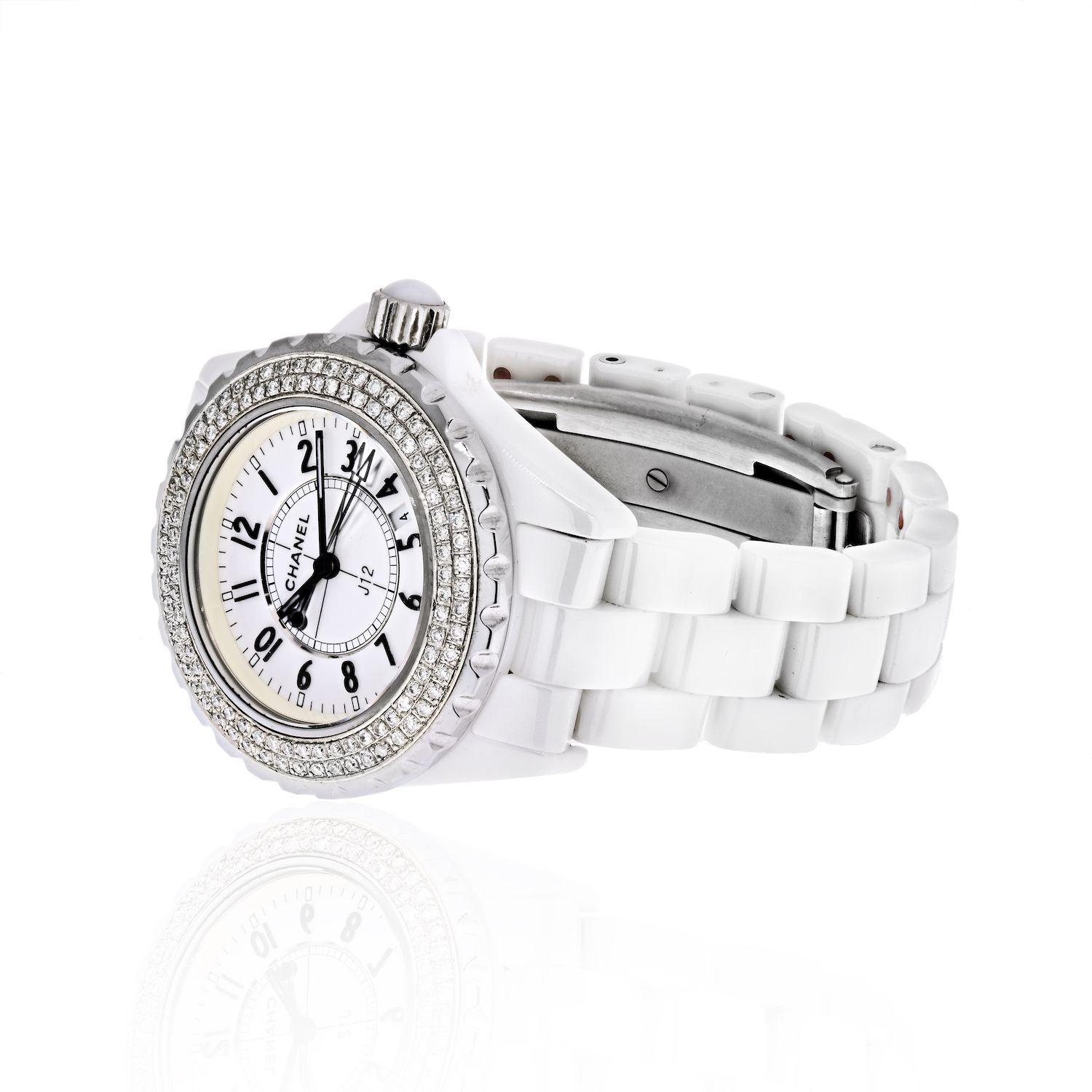 CHANEL Ceramic Stainless Steel Diamond 38mm J12 Quartz Watch White. This stunning watch is beautifully crafted of white high-tech ceramic and stainless steel. Features also include a beautiful rotating bezel trimmed with diamonds with a total
