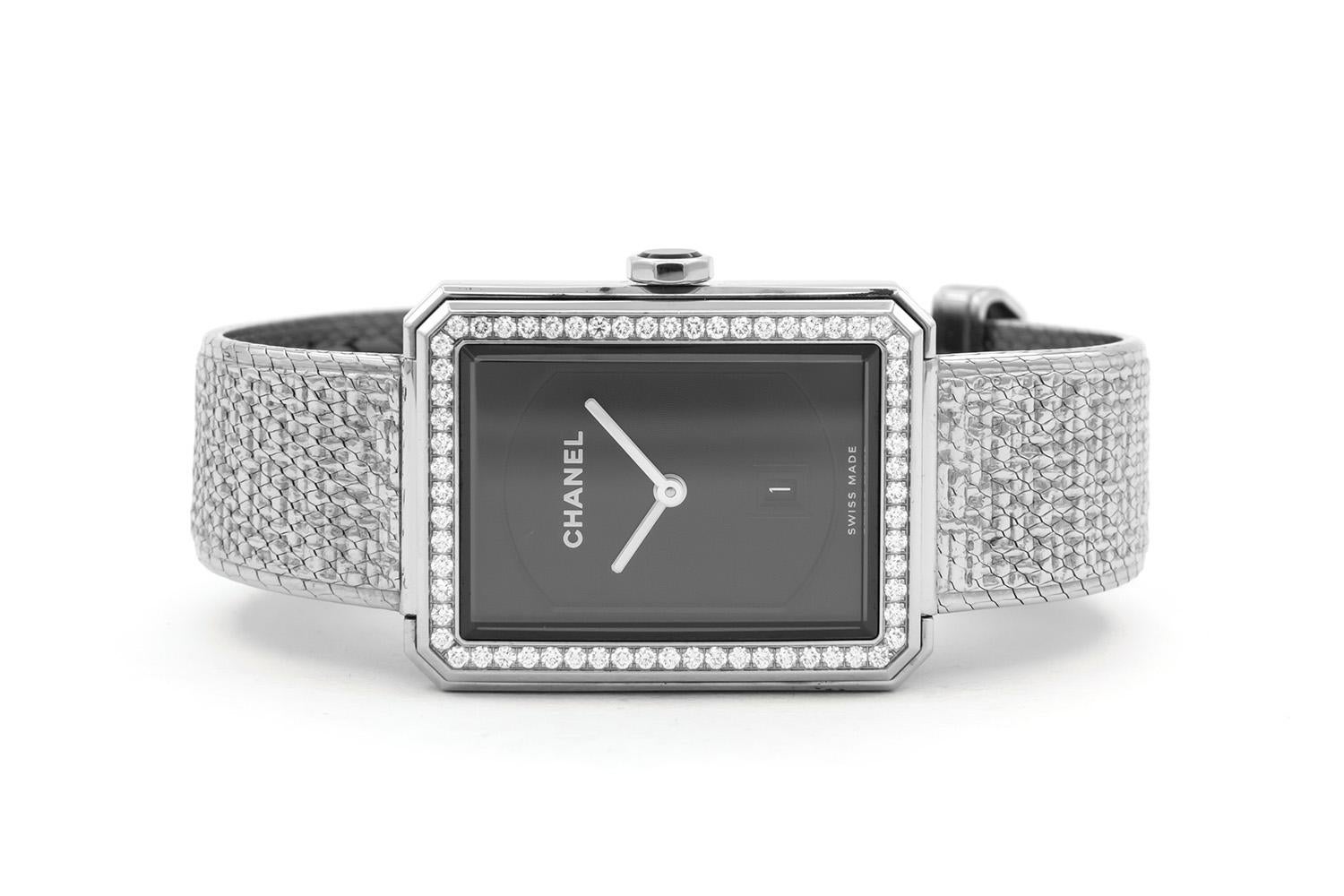 We are pleased to offer this Authentic Chanel Stainless Steel Boyfriend Tweed Watch H5318. This watch features a 26.7mm x 34.6mm stainless steel case, diamond bezel, black dial, quartz movement, and a stainless steel tweed bracelet. This watch will