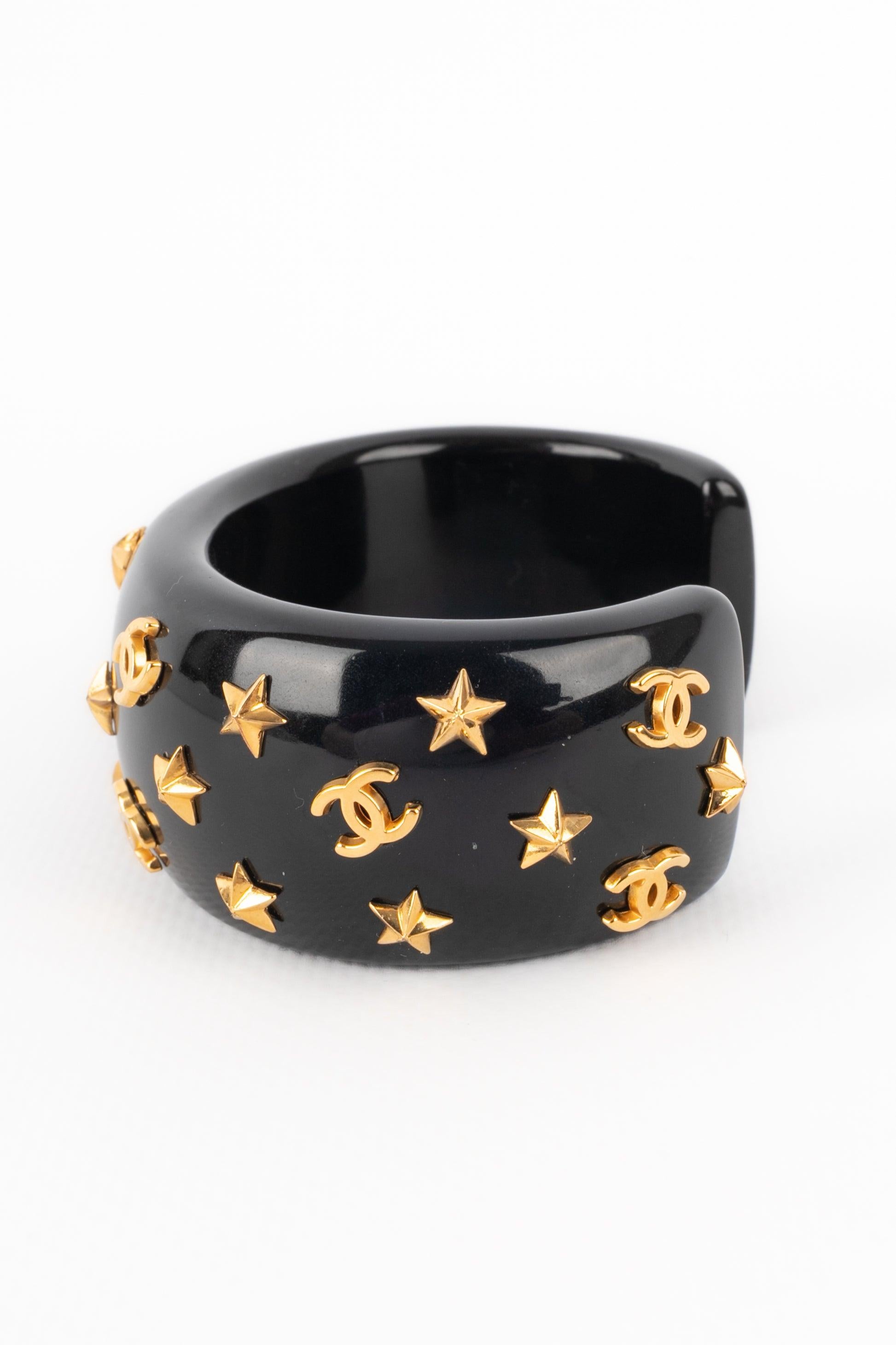 Women's Chanel Starry Cuff Bracelet with Black Bakelite, 1995 For Sale