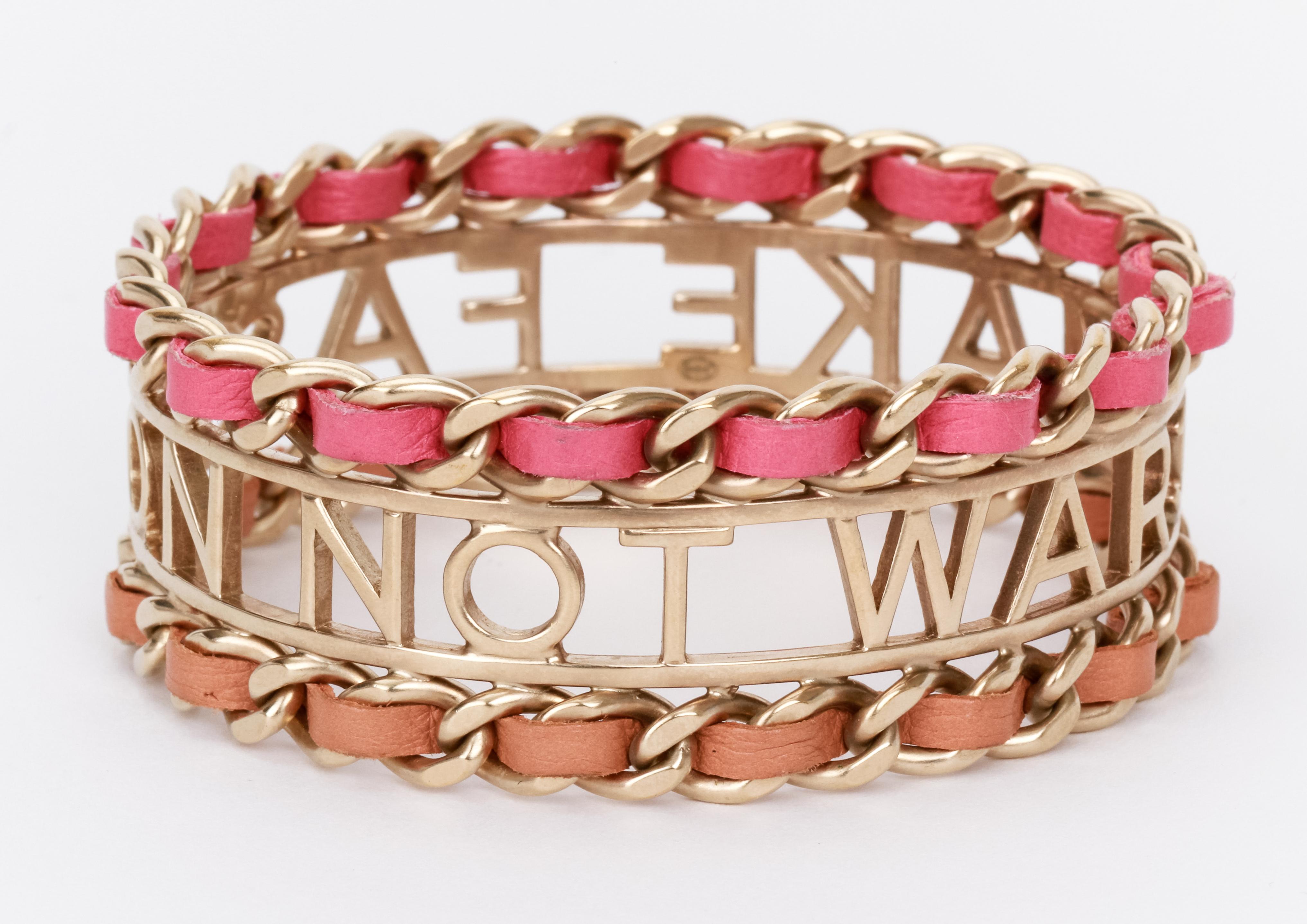 Chanel statement light gold bangle with pink and fuchsia leather, medium size, D 2.5