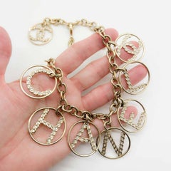 CHANEL LAGERFELD Iconic Statement Logo Letter Cut Out Charm Necklace 2010s