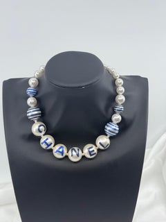 CHANEL Blau-weiß gestreiftes Perlenhalsband, Collection'S La Pausa