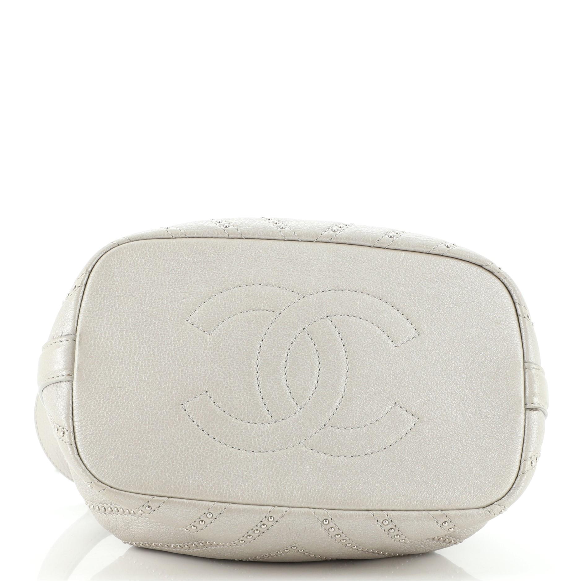 Chanel Stud Wars Drawstring Bucket Bag Embellished Chevron Lambskin Mini In Fair Condition In NY, NY