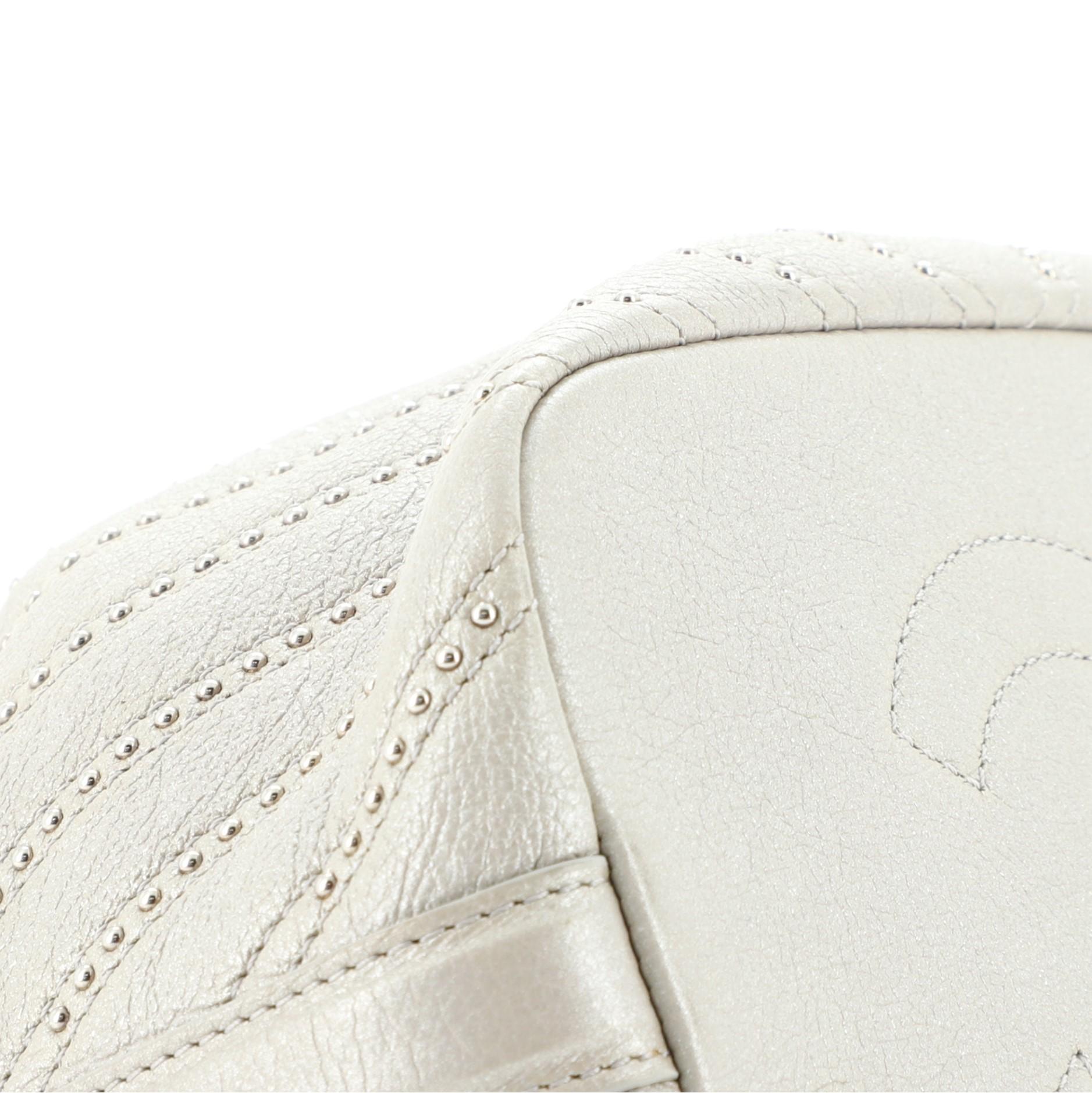 Chanel Stud Wars Drawstring Bucket Bag Embellished Chevron Lambskin Mini 1