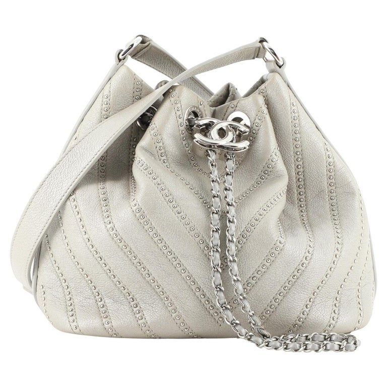 Chanel Stud Wars Drawstring Bucket Bag Embellished Chevron Lambskin Mini at  1stDibs