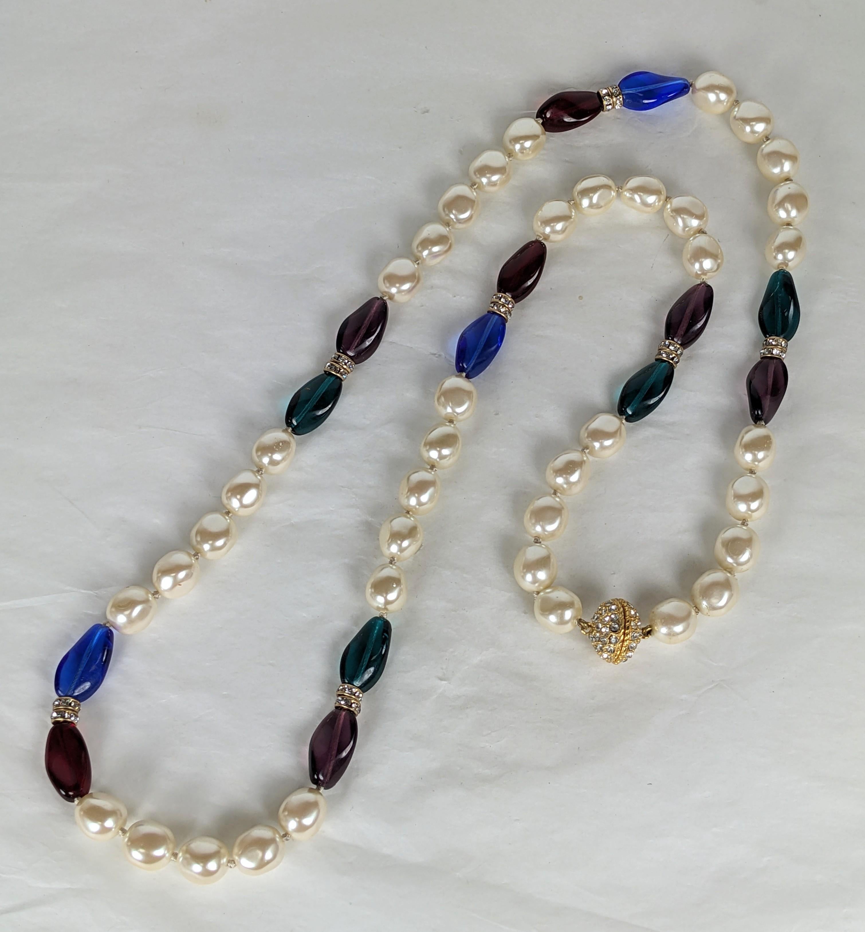 Elegant Chanel Style Pearl and Pate de Verre Sautoir from the 1990's. High quality faux jewelry made in Italy with hand knotted pearls, glass beads with crystal rondels and pave snap clasp. 40