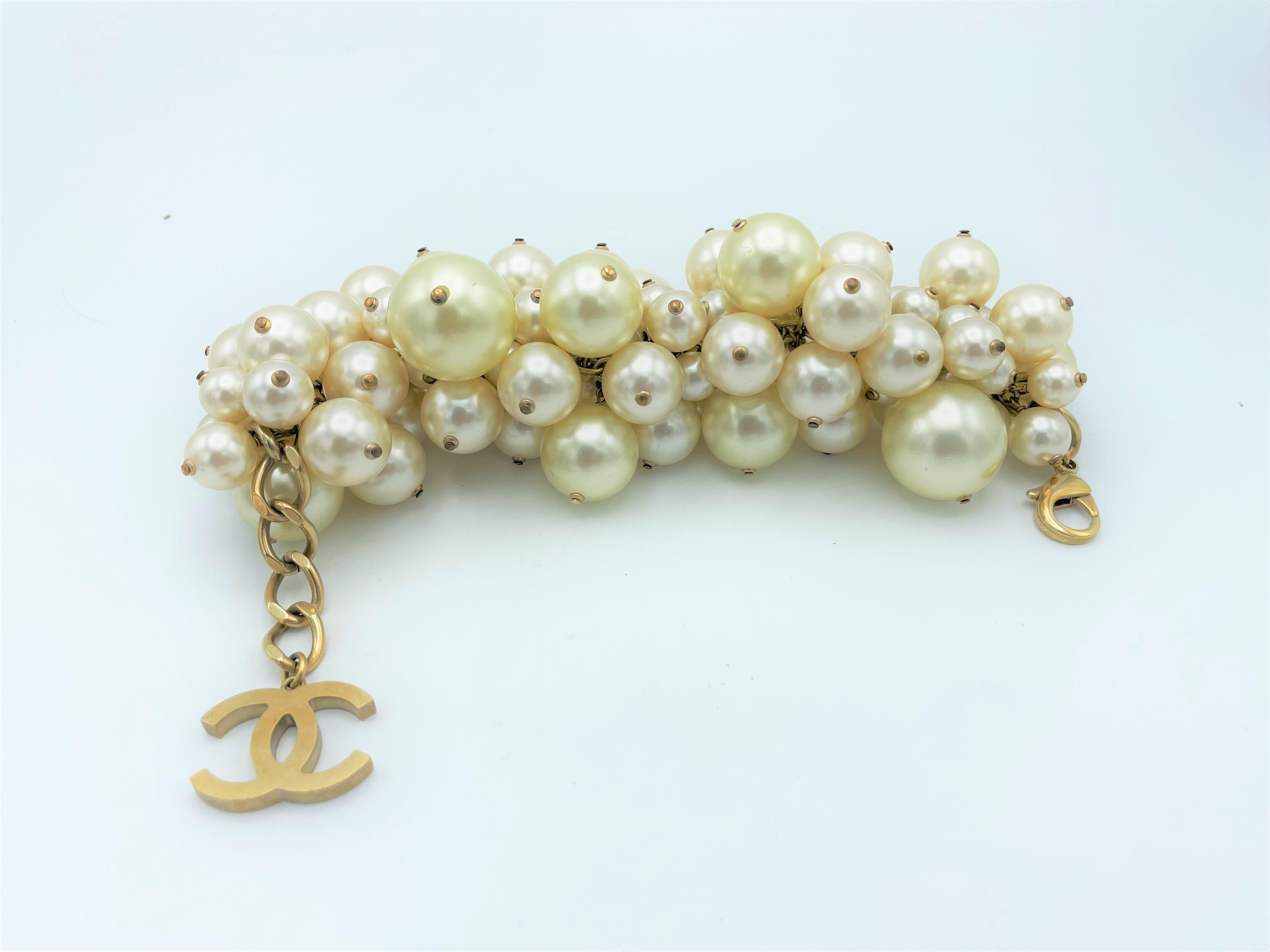 Women's Chanel summer gold metal CC Cluster ball bracelet, collection 2013 For Sale
