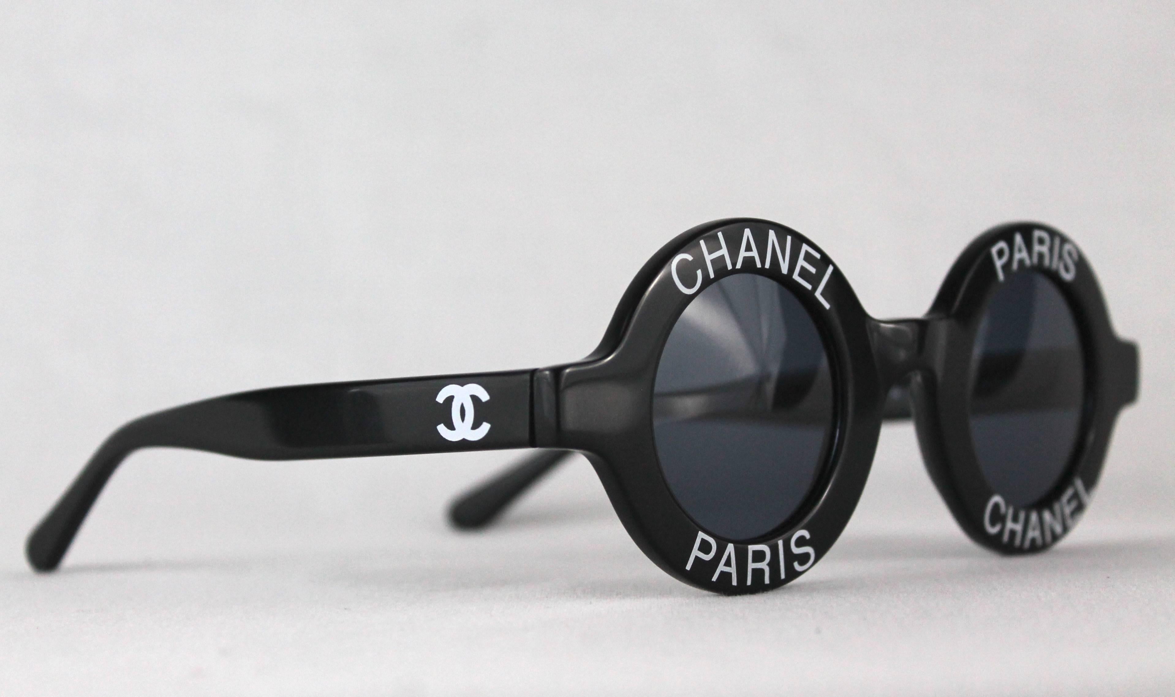 Chanel Logo Round Sunglasses from SS93
-Incredibly rare and iconic shades from Chanel seen on the Spring Summer 1993 runway
-Features brand's logo on each lens
-Style has been made famous by notable wearers 
-Comes with non-branded sunglass case
