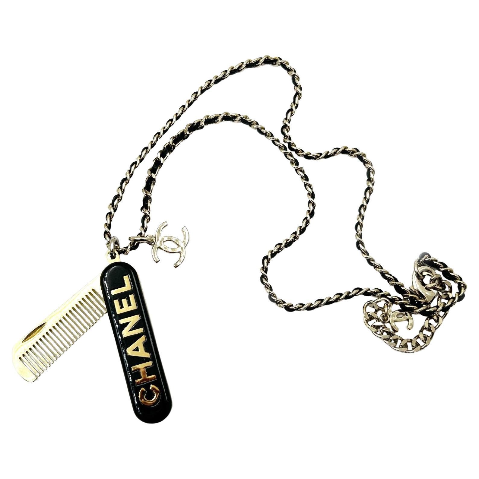 Chanel Super Rare Gold CC Black Comb Mirror Pendant Necklace en vente