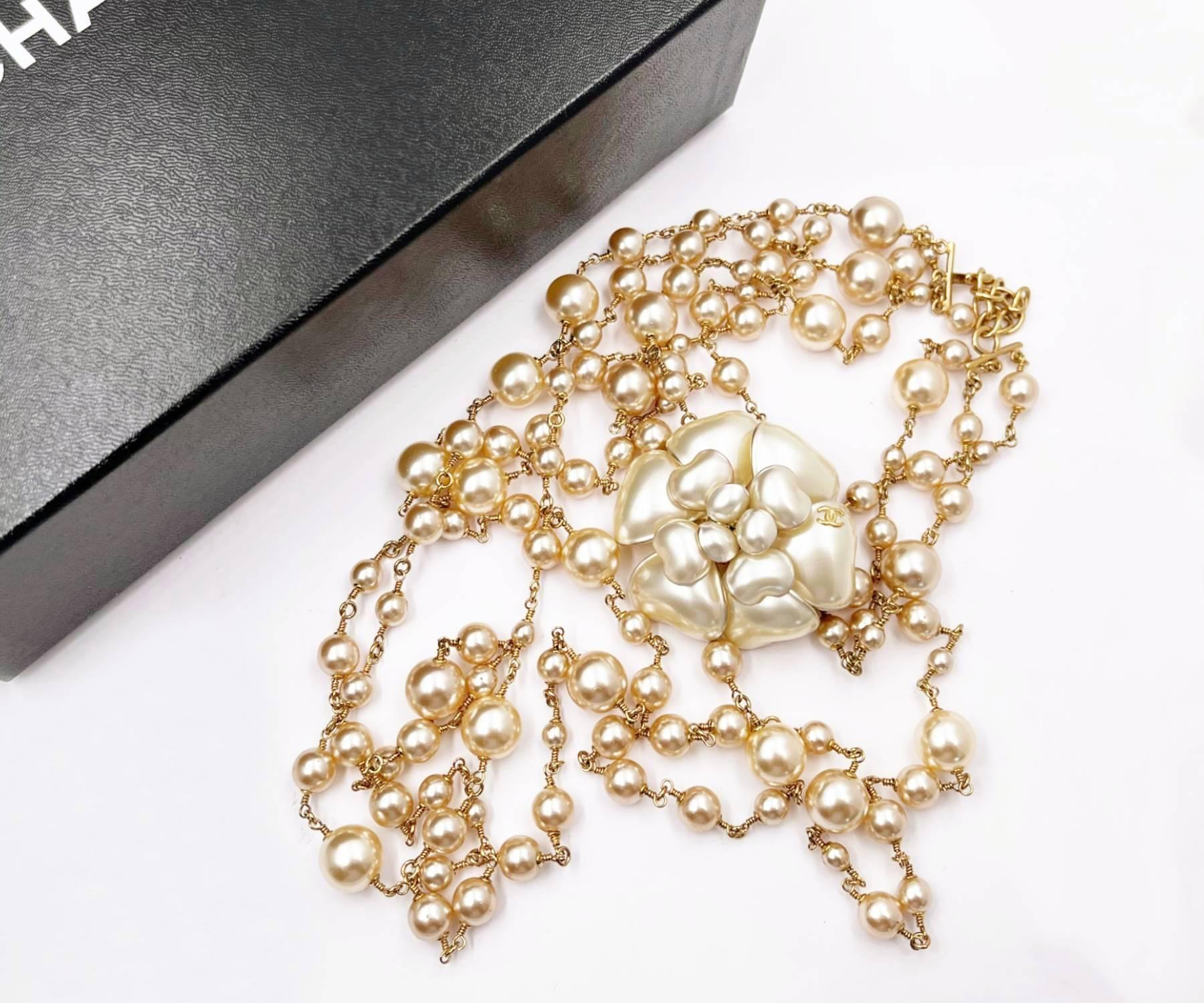 Chanel Super Rare Gold CC Pearl Camellia Super Long Choker Evening Pearl Necklace

*Stamp is marked 02. It is a year of 2002 design.
*Made in France
*Comes with original box

-It is approximately 13.5″ to extended 16″ total choker length.
-It is