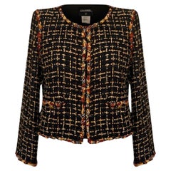 Chanel New Black Ribbon Tweed Jacket with Jewel Emblishment (Veste en tweed avec rubans et ornements)