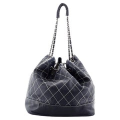 Chanel Surpique Drawstring Bucket Bag Quilted Lambskin Medium