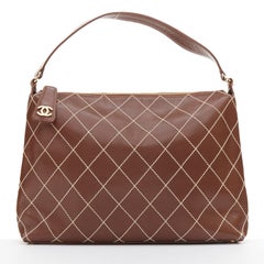 CHANEL Surpique Wild Stitch brown leather gold CC logo shoulder hobo bag
