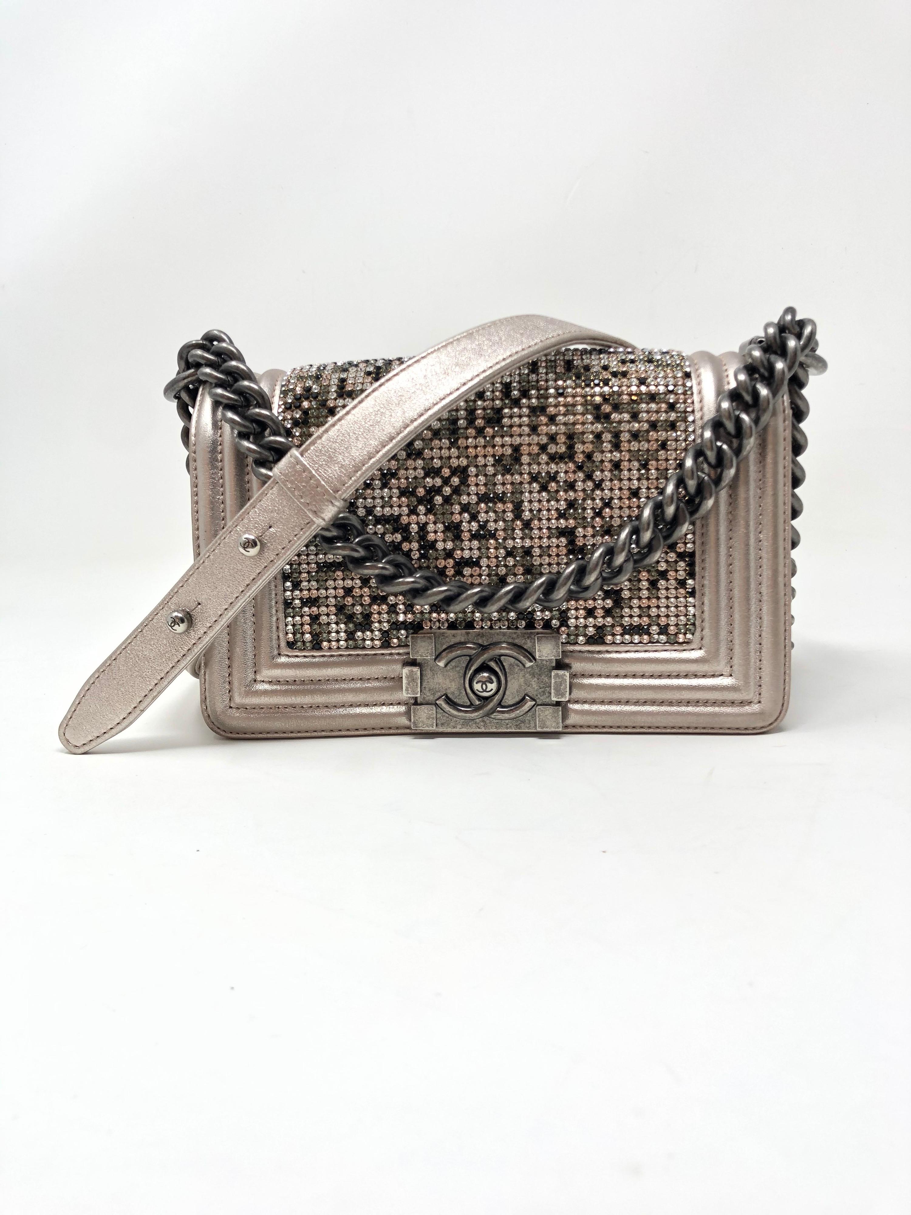 Chanel Swarovsky Crystal Boy Bag. Champagne metallic color leather Boy bag with multi color crystals. Mint condition. Beautiful and unique bag. Small size Boy with antique silver hardware. Guaranteed authentic. 