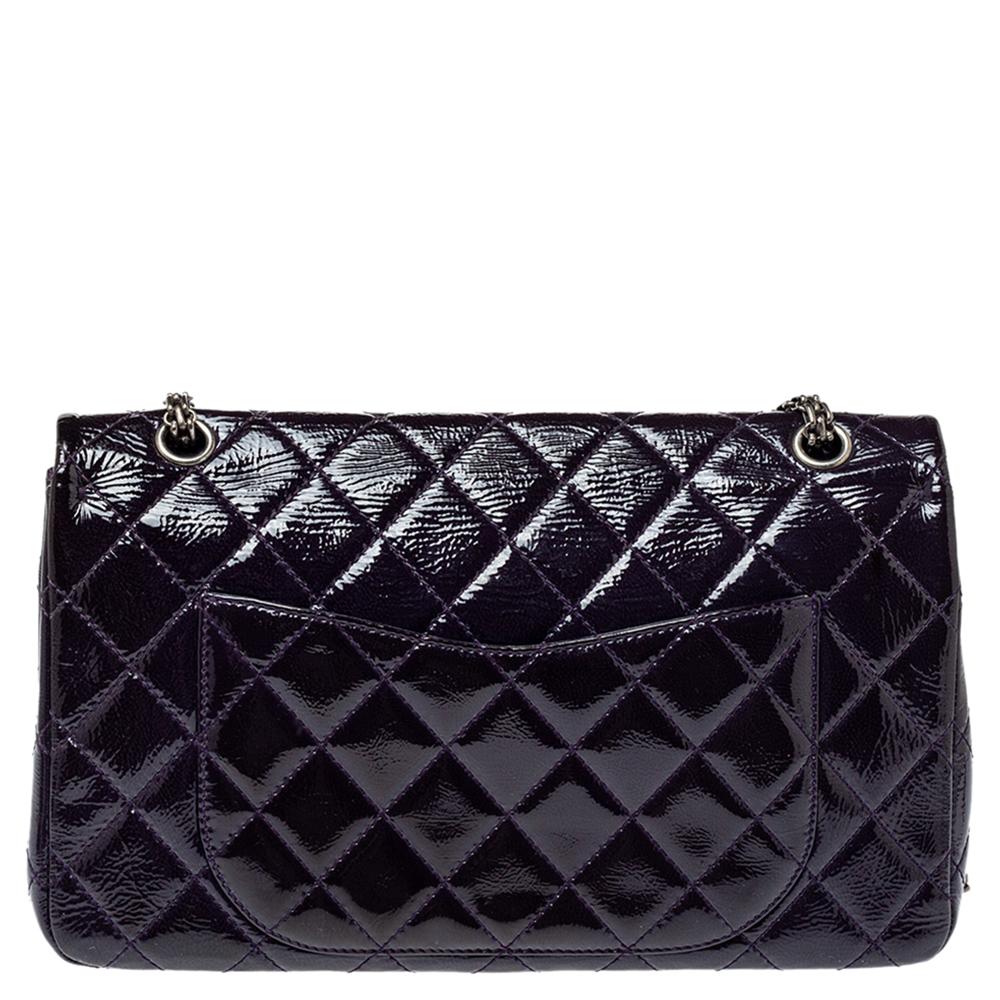 Every Chanel creation carries an irreplaceable style, like this stunner, Reissue 2.55 Classic 227 flap bag. It has been exquisitely crafted from leather in its signature quilted pattern. It comes with a leather-lined interior that houses two slip