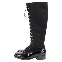 Chanel tall black patent leather toe lace-up knee-high boots