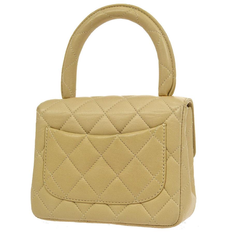 CHANEL Tan Beige Nude Lambskin Leather Gold Mini Small Top Handle Kelly Bag In Good Condition In Chicago, IL