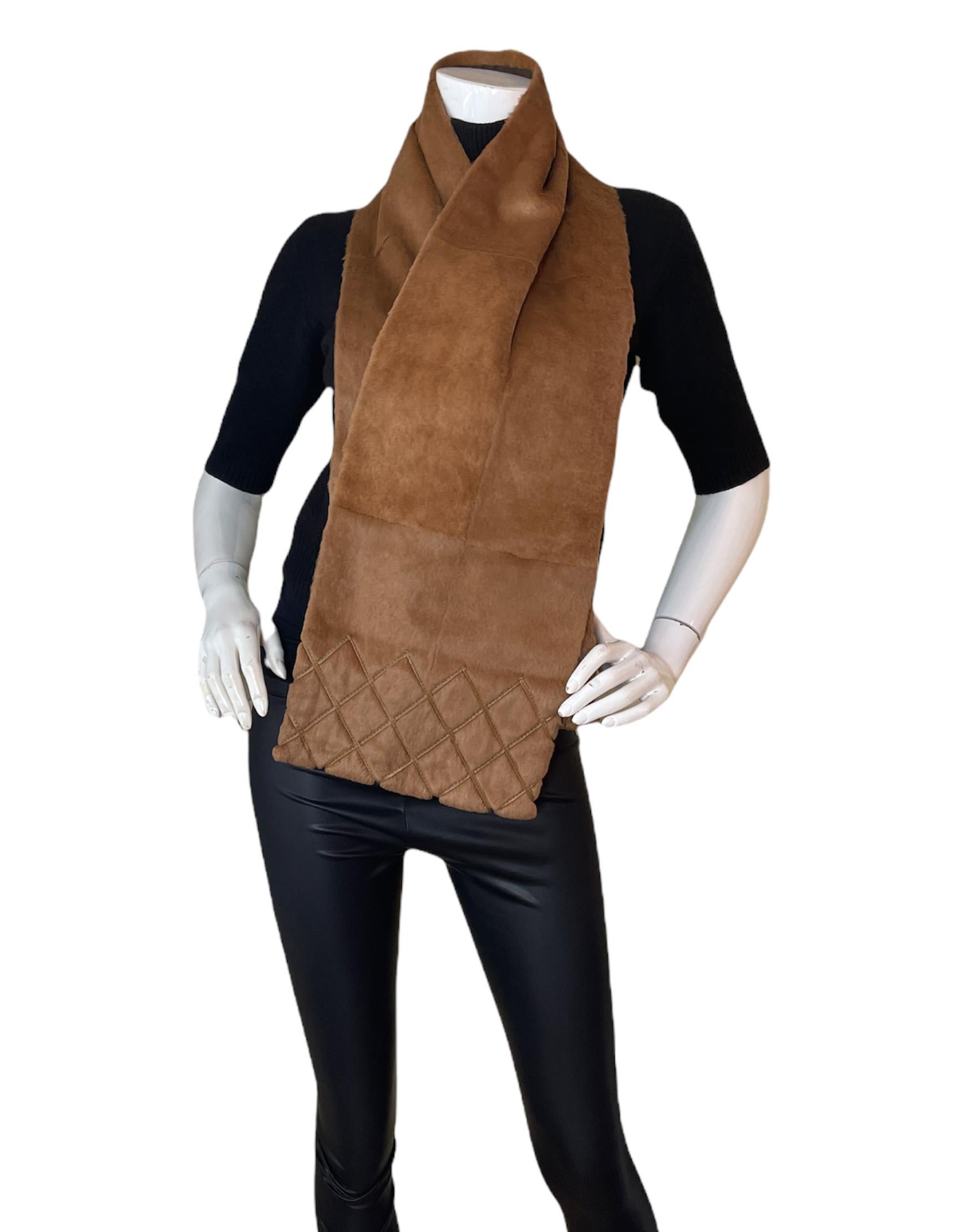 Chanel Tan Rabbit Fur Stole w/ Leather Quilted Stitching at Trim
Color: Tan and brown
Materials: 100% Rabbit Fur; Lining- 50% Wool; 50% Cotton
Overall Condition: Excellent with the exception of missing composition tag

Measurements:
9