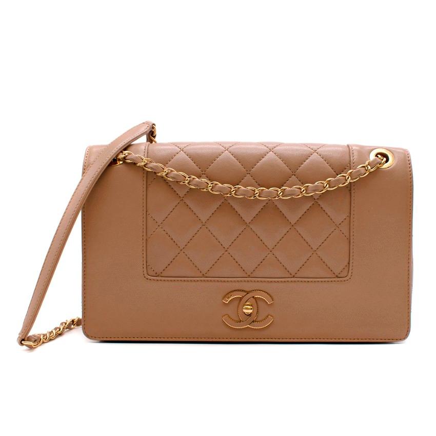 Chanel Tan Calfskin Smooth & Quilted Double Flap Bag

-Exquisitely crafted in their classic quilt design
-Beautifully smooth calfskin leather
-Iconic CC turn lock on flap
-Leather threaded gold chain link shoulder strap
-Signature logo embroidery on
