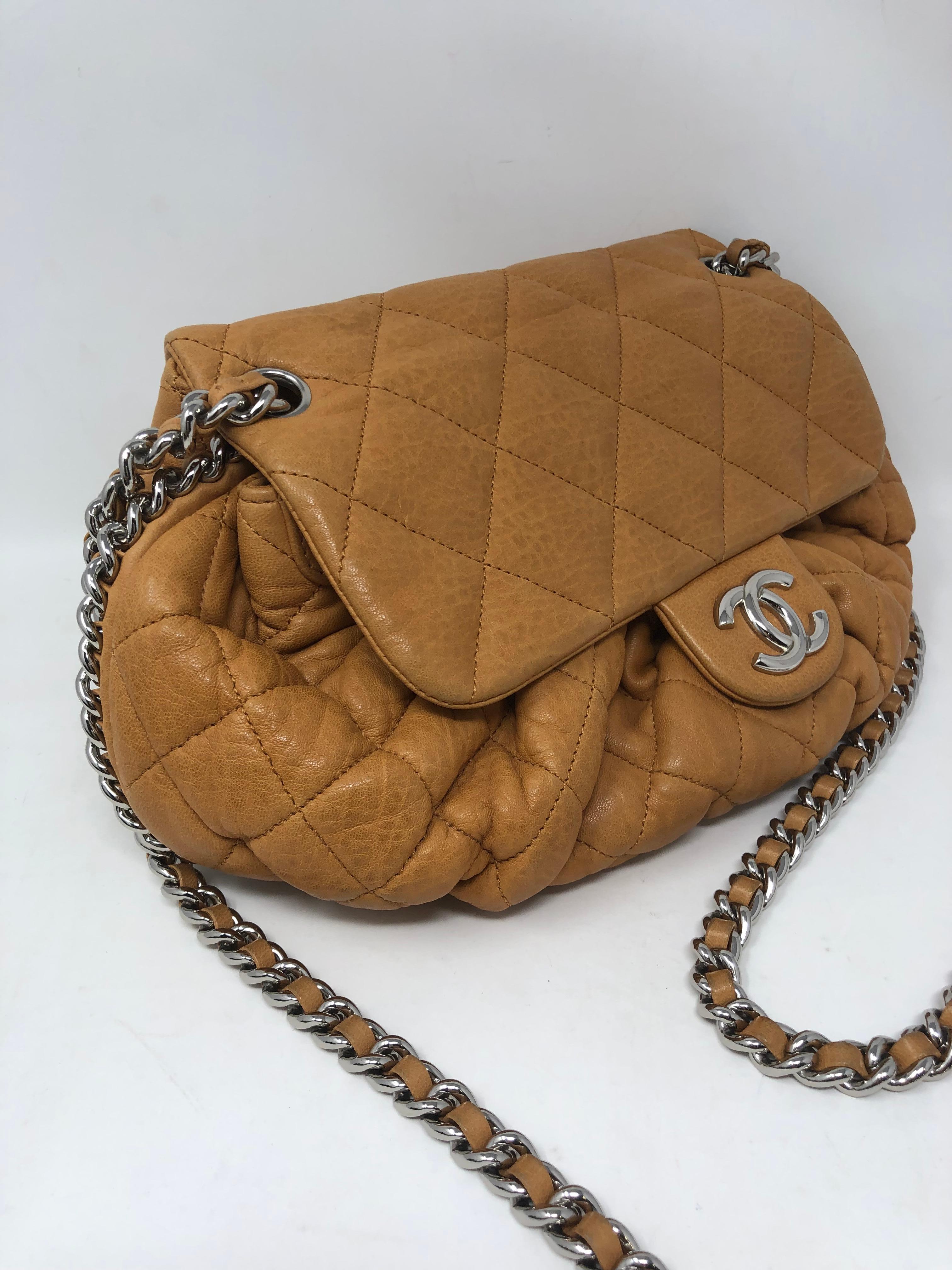 Chanel Tan Chain Around Bag. Nice butterscotch tan color leather in good condition. Silver chain around and hardware.  Medium size crossbody. Chain can be doubled to make shorter. Interior clean. Guaranteed authentic.  