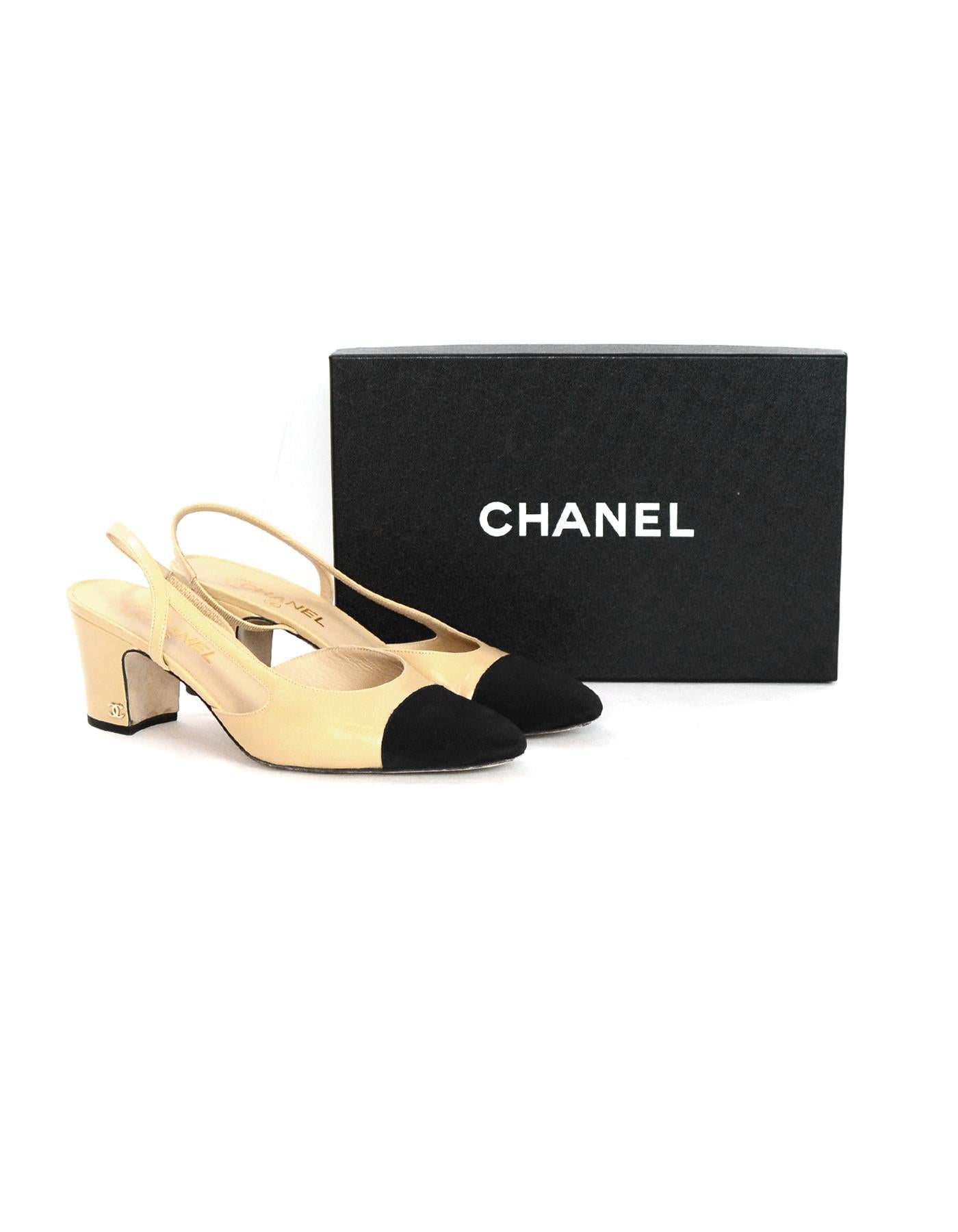 Chanel Tan Leather Black Grosgrain Cap Toe Slingback Heels Sz 40.5

Made In: Italy
Year of Production: 2016
Color: Tan/black
Hardware: Goldtone
Materials: Leather, grosgrain, and metal
Closure/Opening:  Sling back
Overall Condition: Very good
