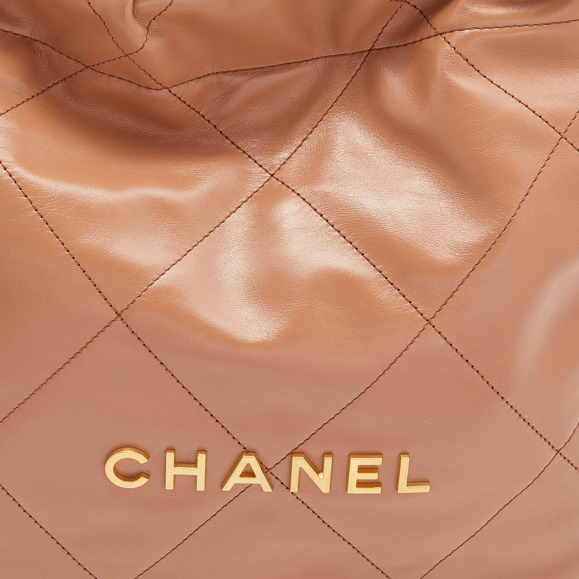 Women's Chanel Tan Quilted Glossy Leather Drawstring 22 Bag