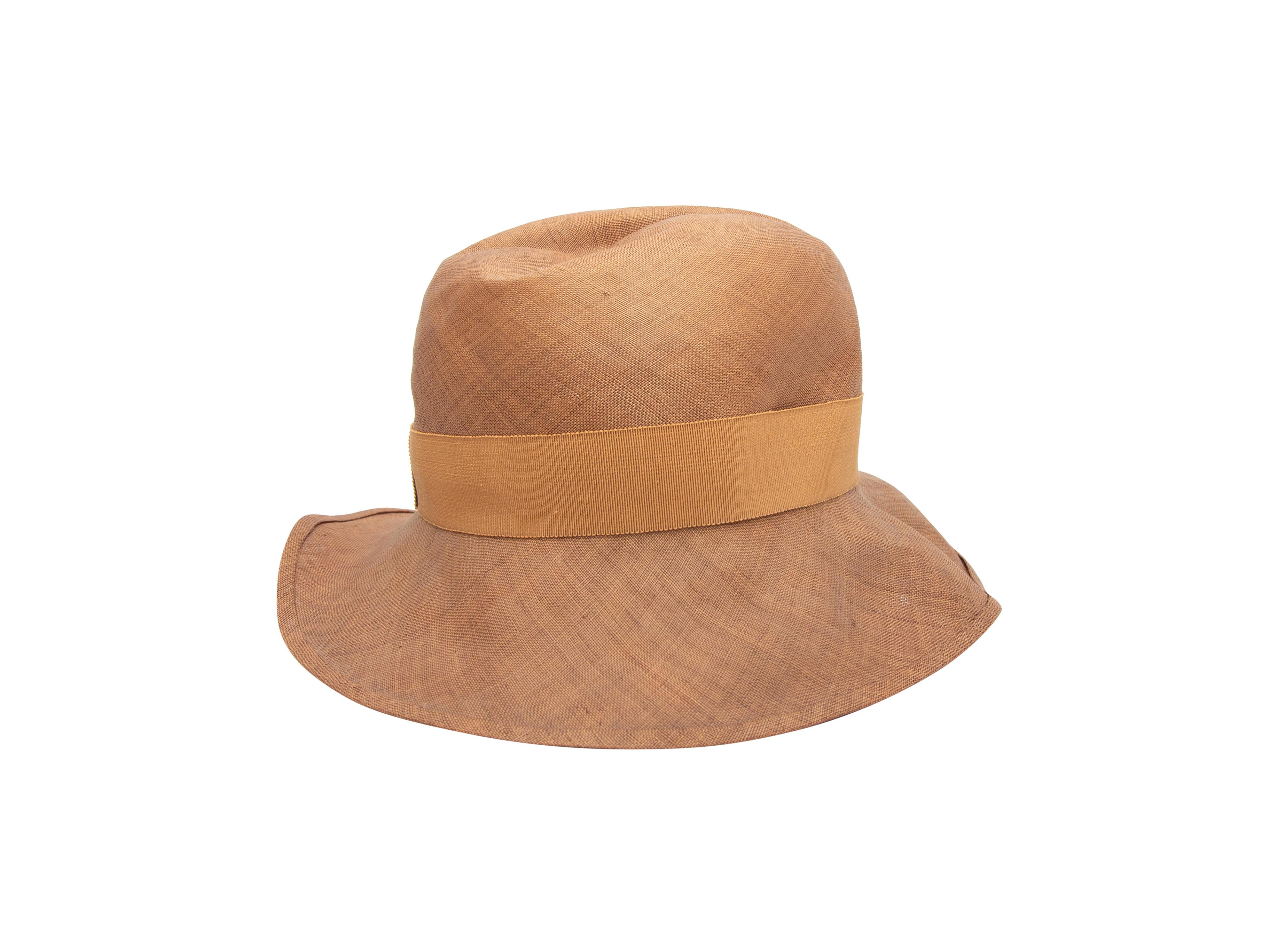 Product details: Vintage tan straw wide brim hat by Chanel. Tonal grosgrain ribbon trim. 5