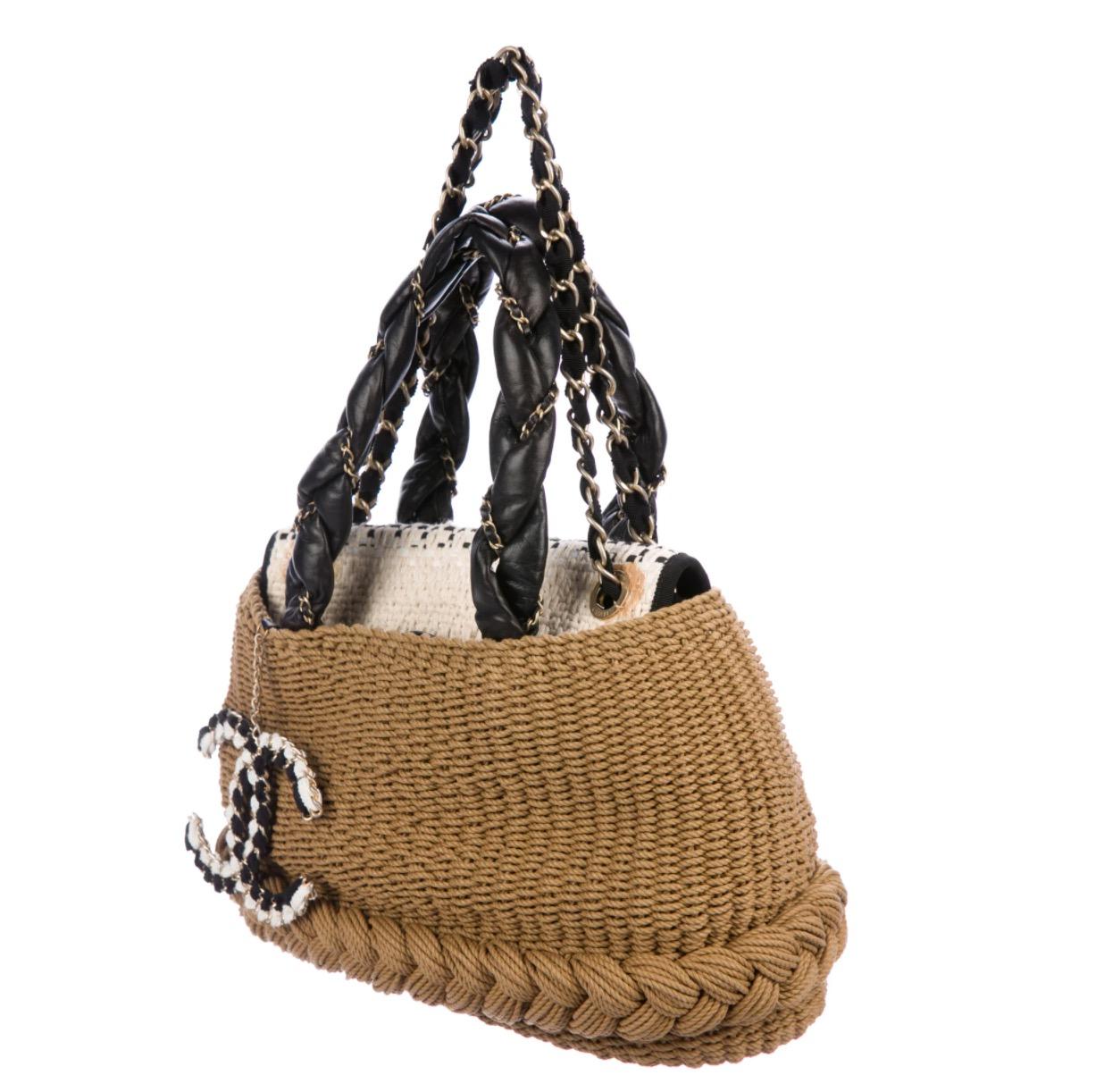 Woven rope 
Straw 
Tweed
Leather
Gold-tone hardware
Grosgrain lining
Magnetic snap closure
Shoulder strap drop 9