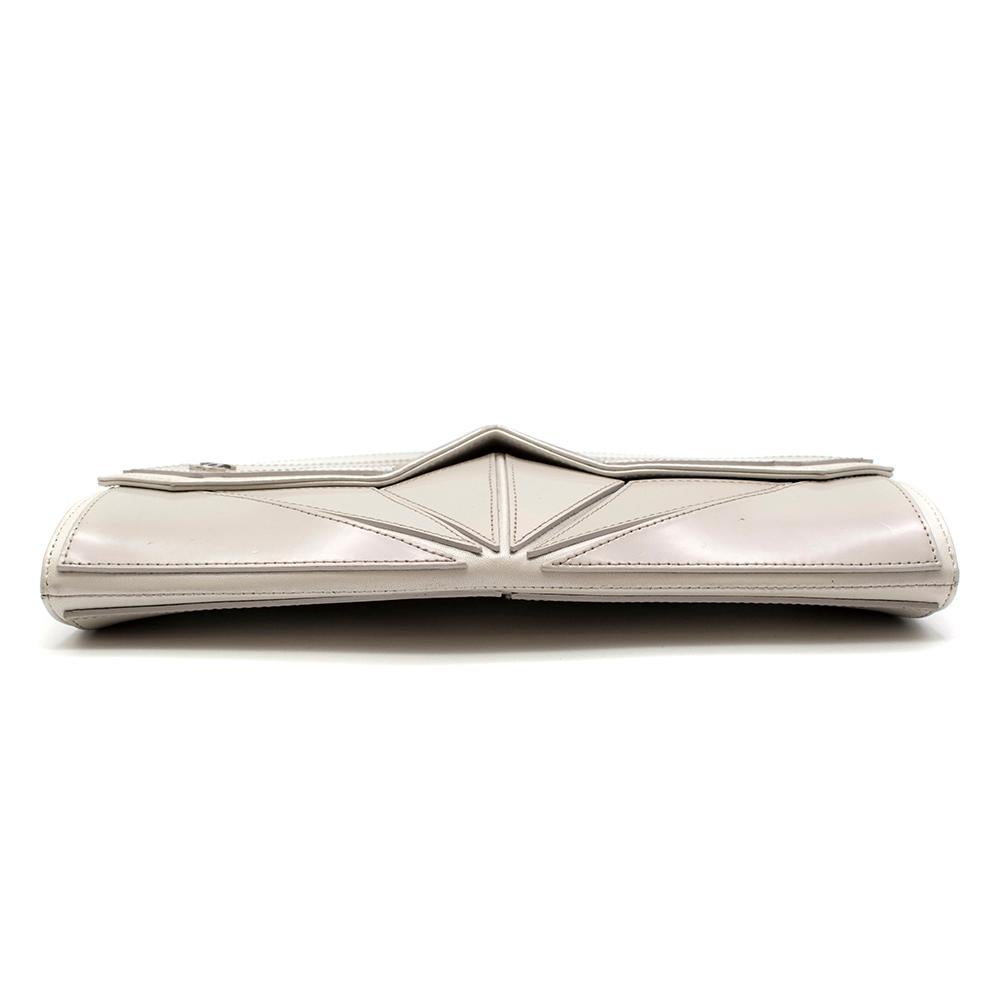 Chanel Taupe Clutch Bag with Shoulder Strap

- Geometric style shape and pattern 
- Iridescent taupe colour
- Magnetic fastening 
- Shoulder strap 
- Silver-finish metalware

Materials:
- Leather

Made in France 

Handle/Strap drop - 22cm
Width -
