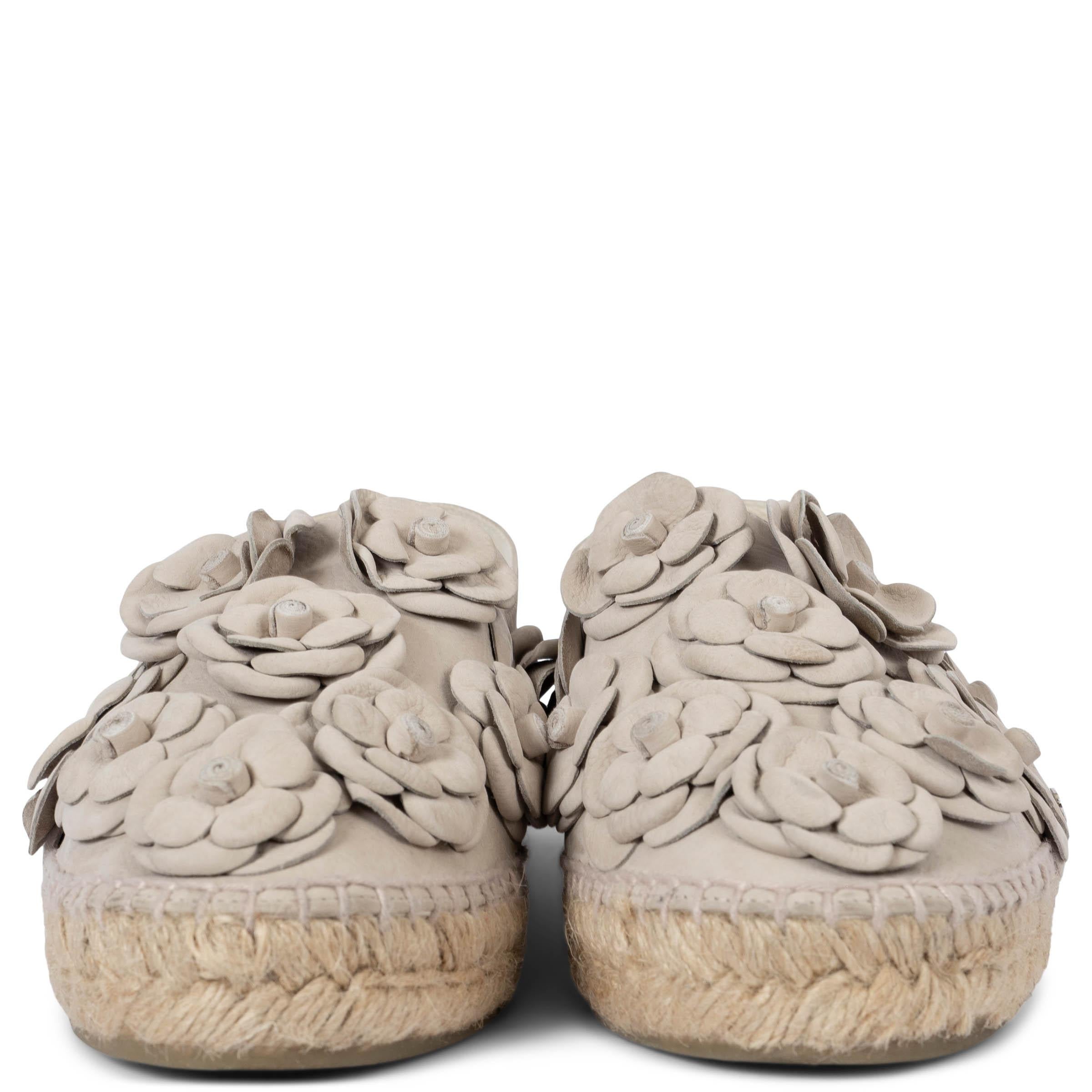 100% authentic Chanel 2017 Cuba espadrilles in taupe nubuck leather embellished with tonal Camellia blossoms. Lined in ecru leather. Have been worn once and are in virtually new condition. 

Measurements
Model	17C G29904
Imprinted Size	42
Shoe