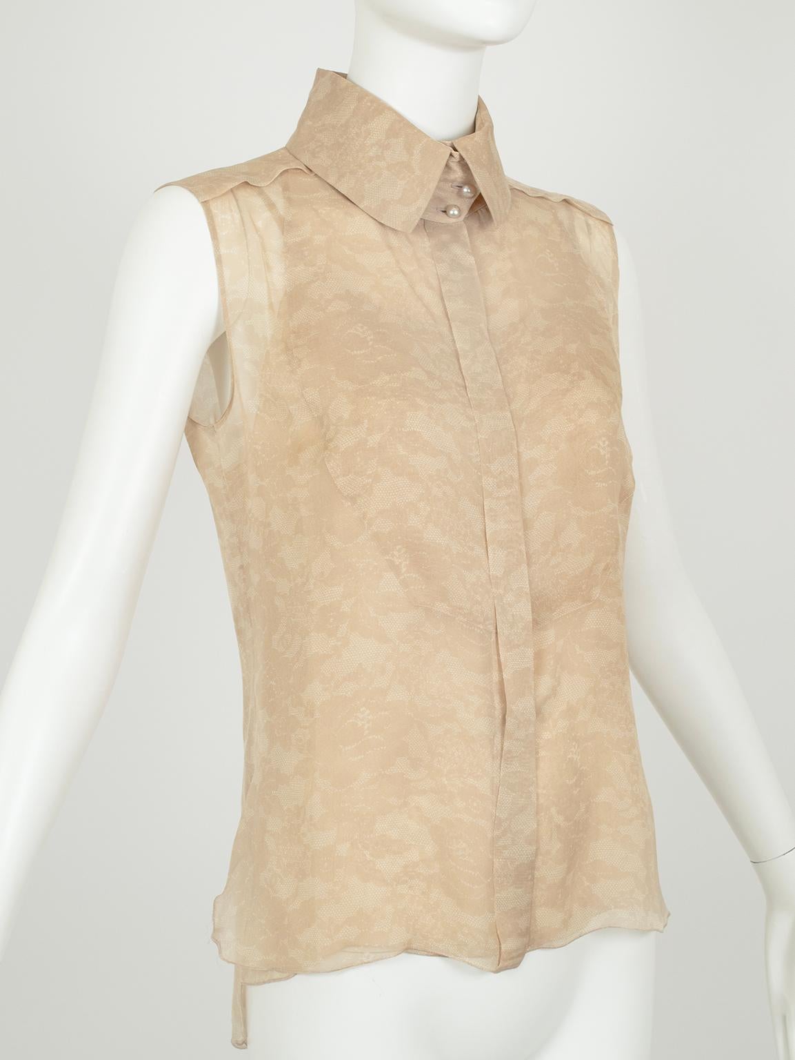 Coco Chanel’s favorite flower, the camellia, is uniquely depicted in a subtle trompe l’oeil lace print on this airy blouse and camisole. Its loosely Victorian styling features a bib front, wide collar and high pearl-button neckline, which would