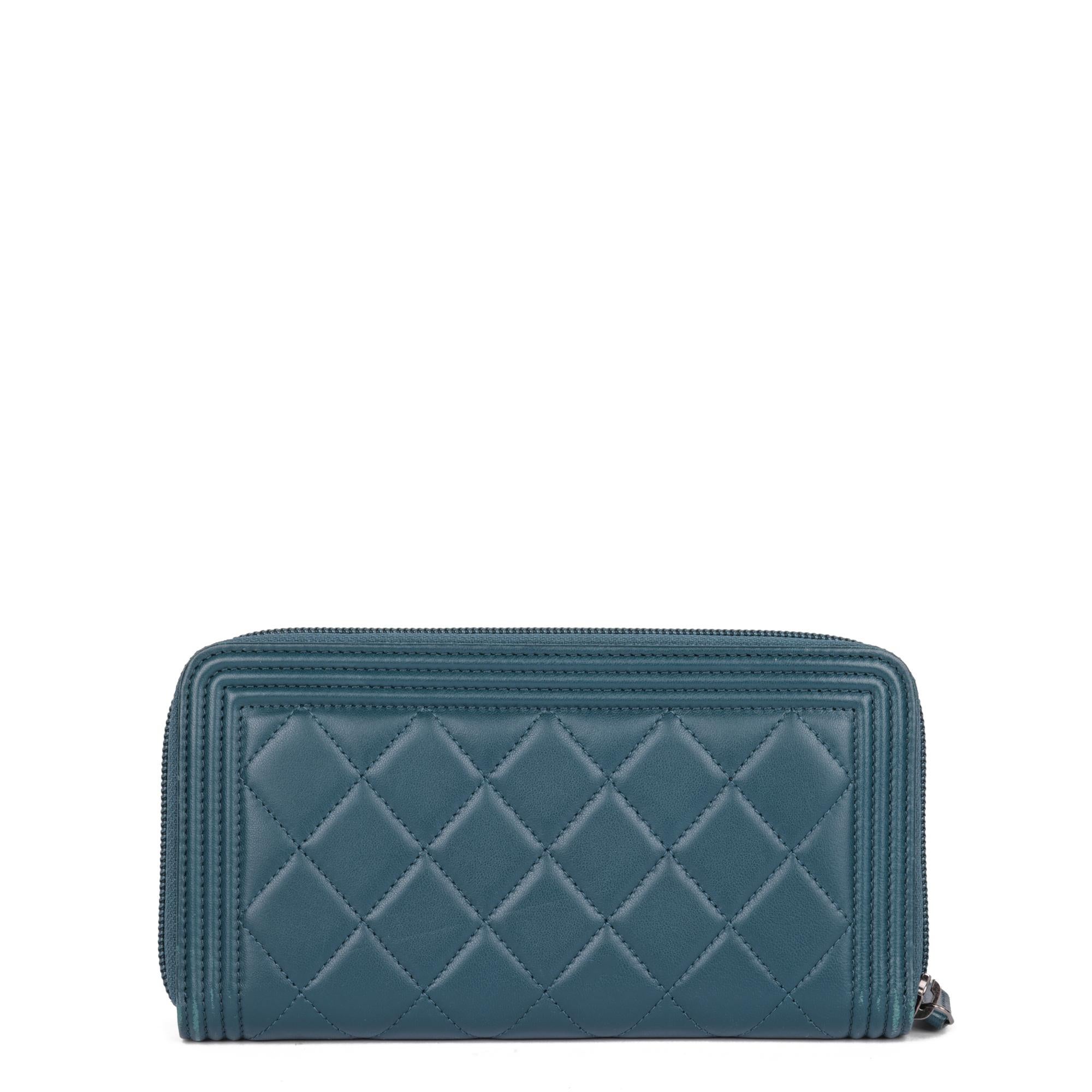 Chanel Teal Lambskin Leather Boy Matrasse Long Wallet

CONDITION NOTES
The exterior is in very good condition with minimal signs of use.
The interior is in exceptional condition with minimal signs of use.
The hardware is in very good condition with