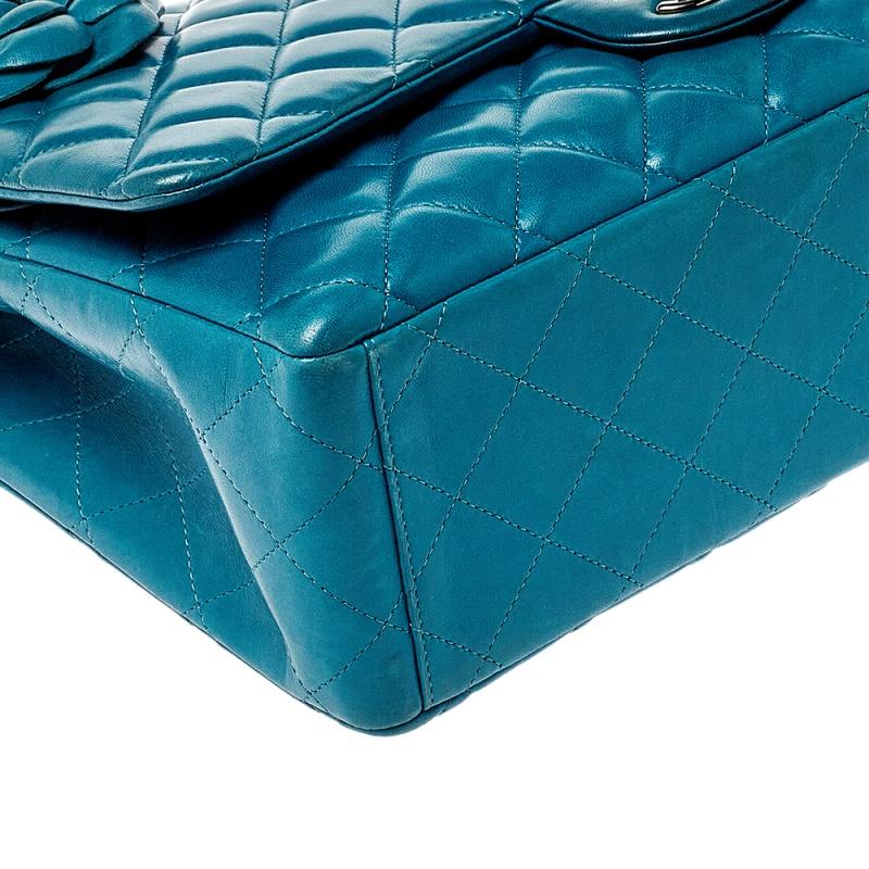 Chanel Teal Quilted Leather Maxi Camellia Applique Double Flap Bag In Fair Condition In Dubai, Al Qouz 2