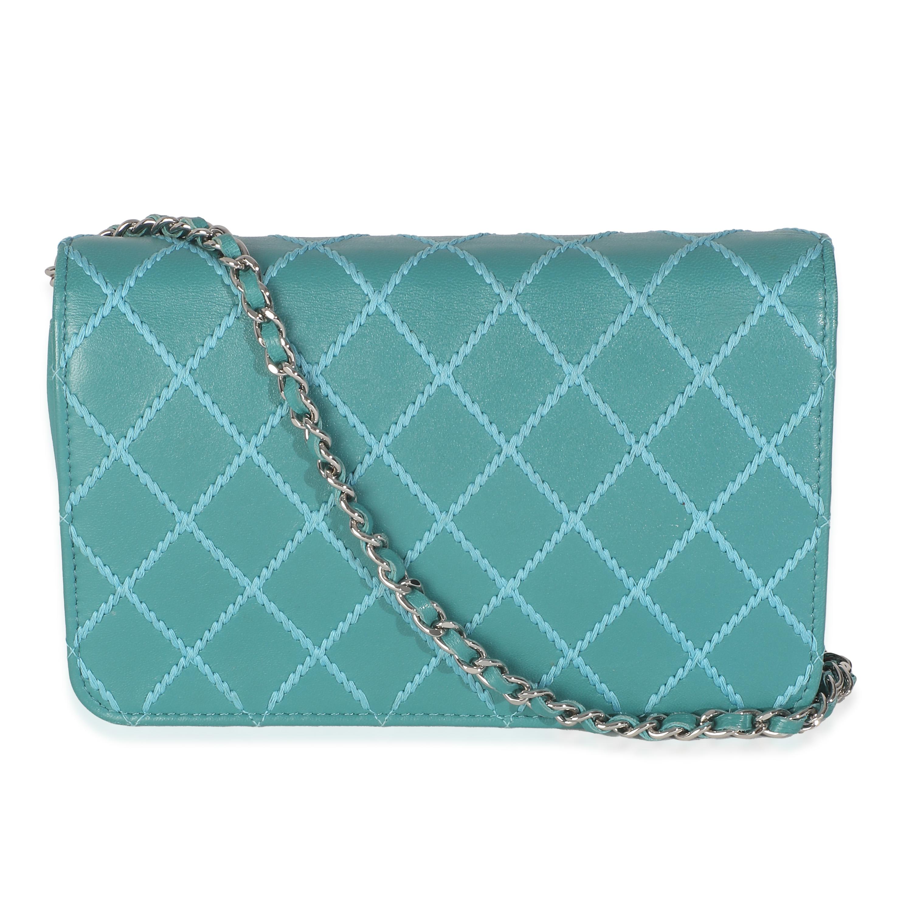 Listing Title: Chanel Teal Stitched Calfskin Wallet On Chain
SKU: Z146275
Condition: Pre-owned 
Handbag Condition: Very Good
Condition Comments: Item is in very good condition with minor signs of wear. Scuffing along exterior and strap. Loose stitch