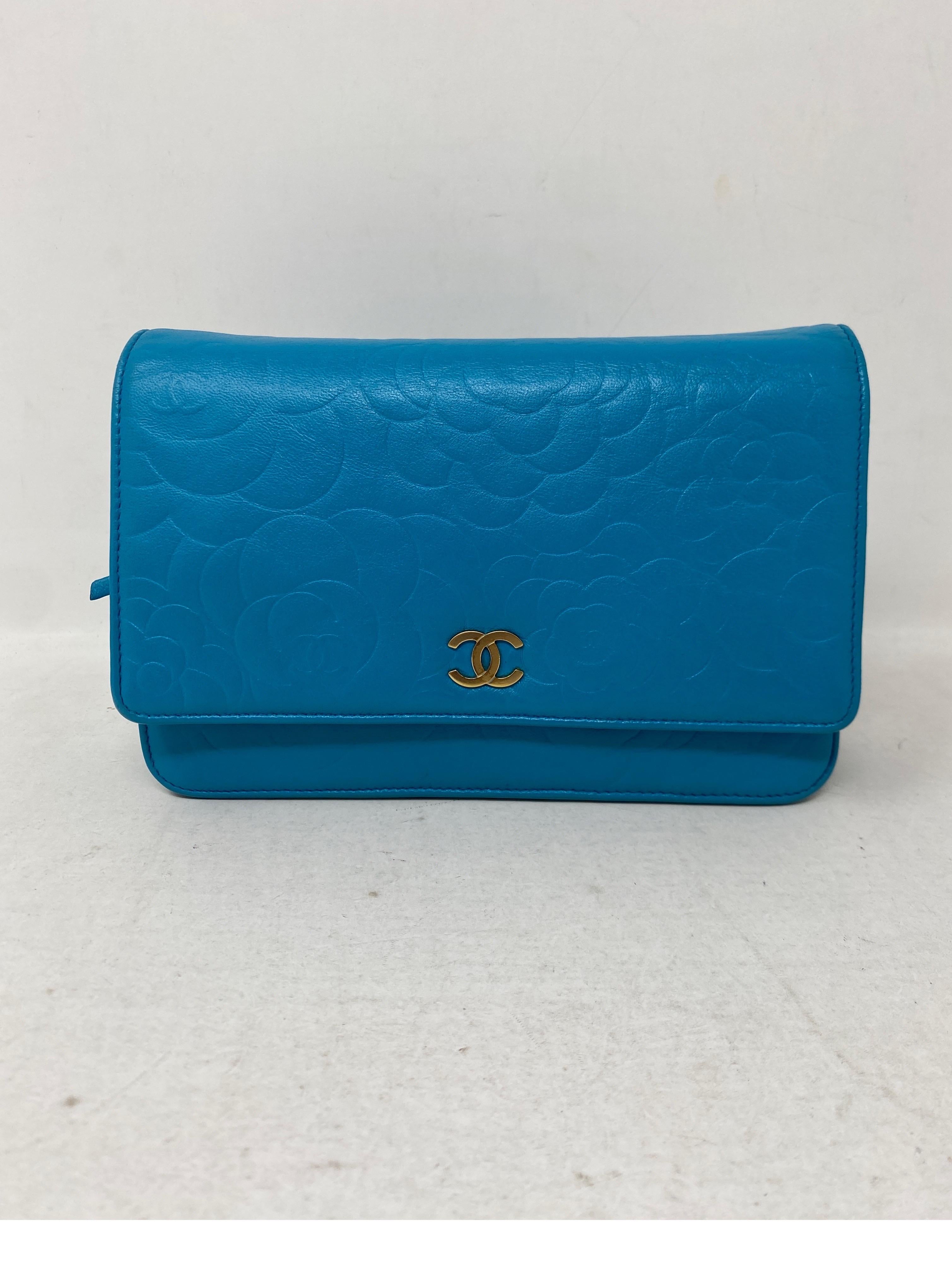 Chanel Teal Wallet On A Chain Bag. Bright turquoise teal color leather bag. Can be worn crossbody or as a shoulder bag. Can also be worn as a clutch or wallet. Multiple uses. Great condition. Interior clean. Includes authenticity card. Guaranteed