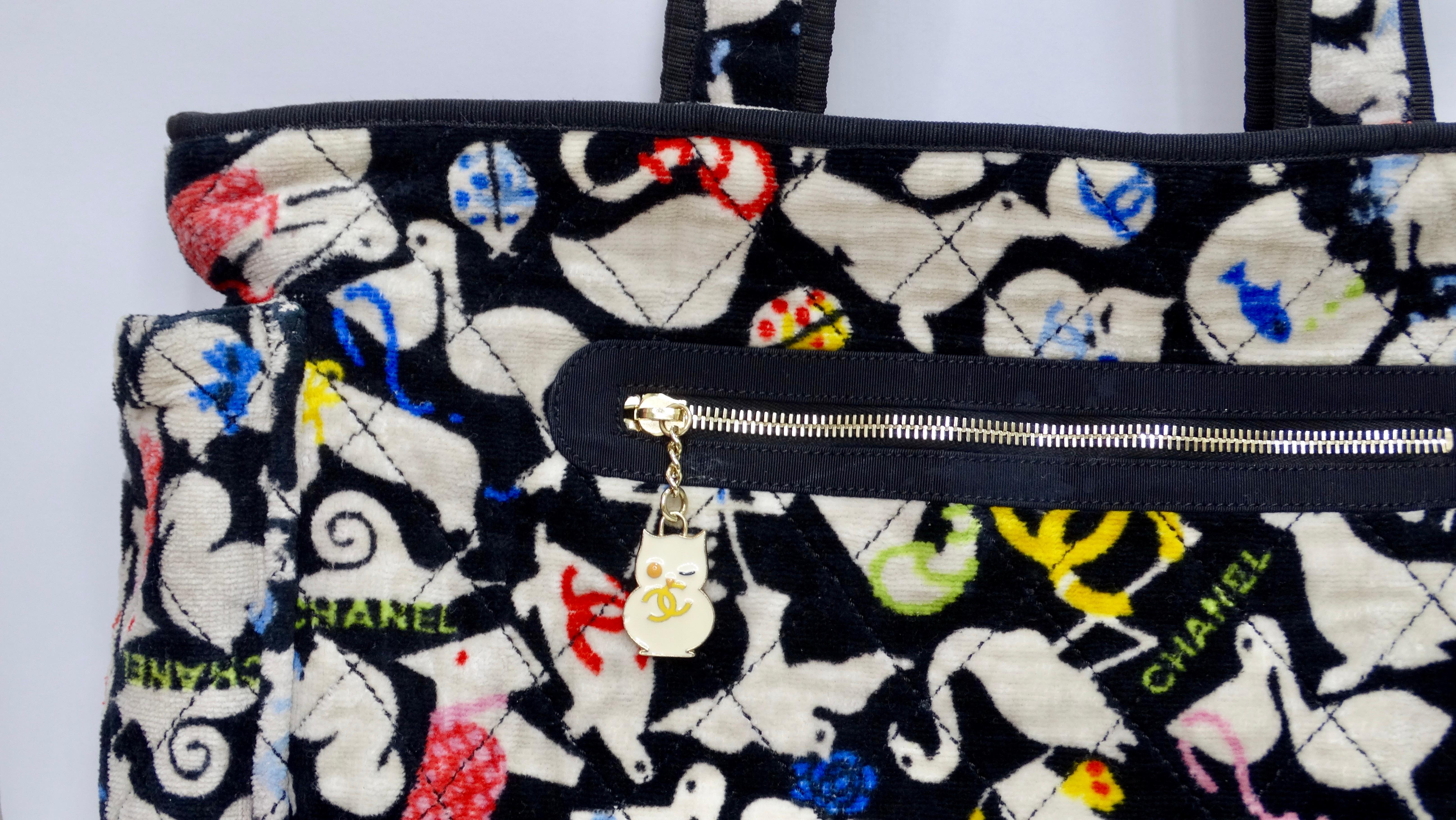 This is a marvelous diaper bag that is practical and chic, from Chanel! Just because you are a new mom doesn't mean you can't be fabulous! This diaper bag is featured in a soft terry diamond-quilted cotton with an adorable print depicting baby