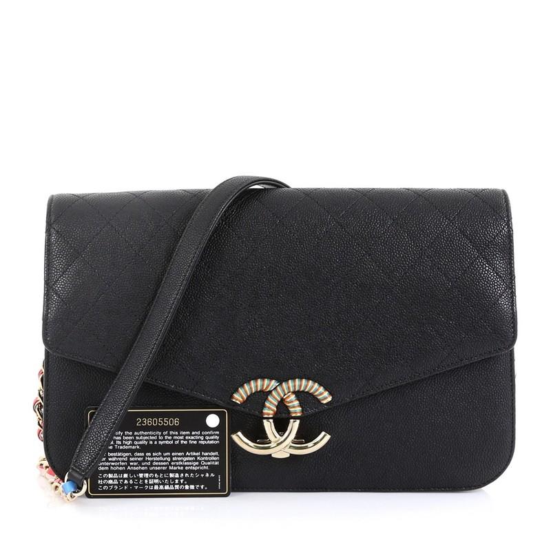 ThisChanel Thread Around Chain Flap Bag Quilted Caviar Medium, crafted in black quilted caviar leather, features woven-in leather chain strap with leather pad, woven CC logo embellishment at front and gold-tone hardware. Its push-lock closure opens