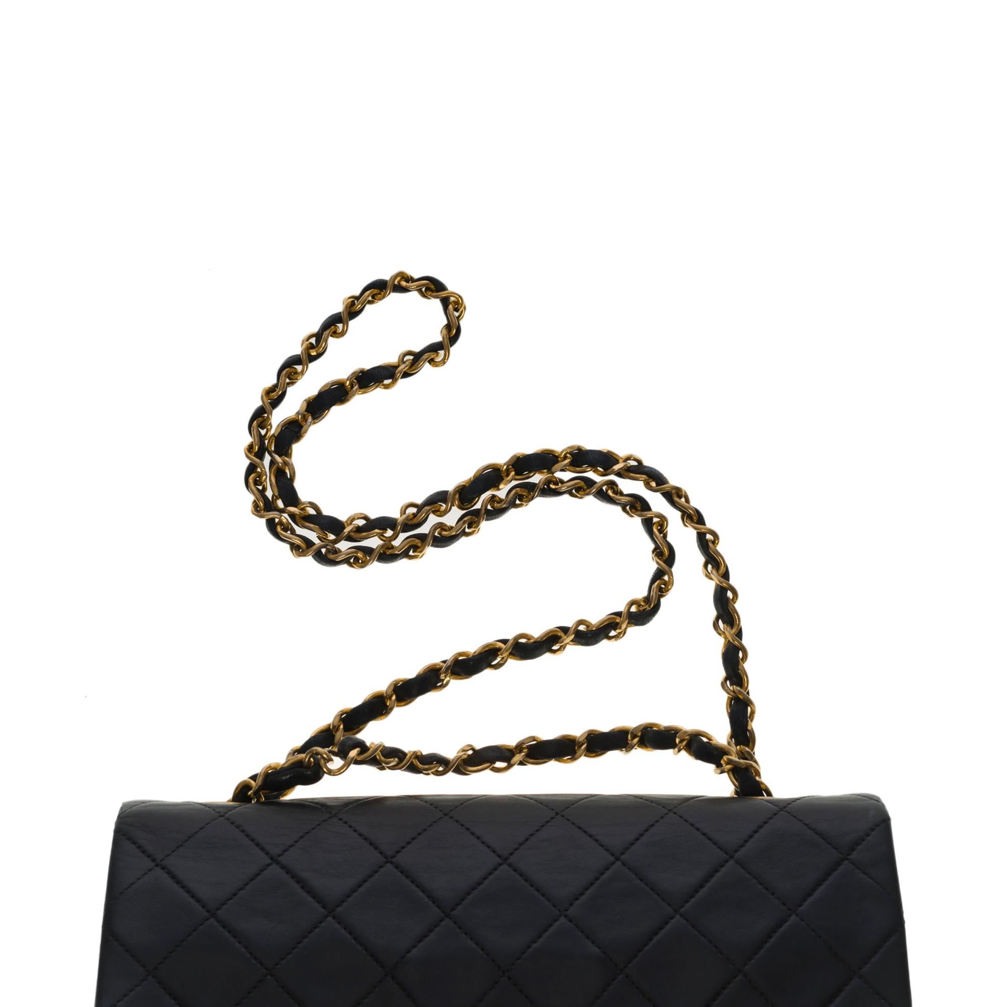 Chanel Timeless 23 cm double flap shoulder bag in black quilted lambskin, GHW 1