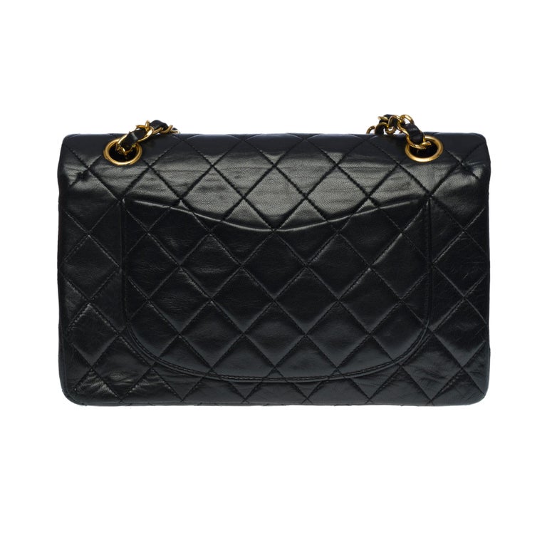 Chanel Timeless 23cm double flap shoulder bag in black quilted