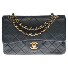 Chanel Timeless 23cm double flap Shoulder bag in black quilted lambskin, GHW