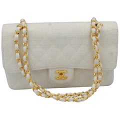 Chanel Timeless 25 in white linen and gold metal finishes