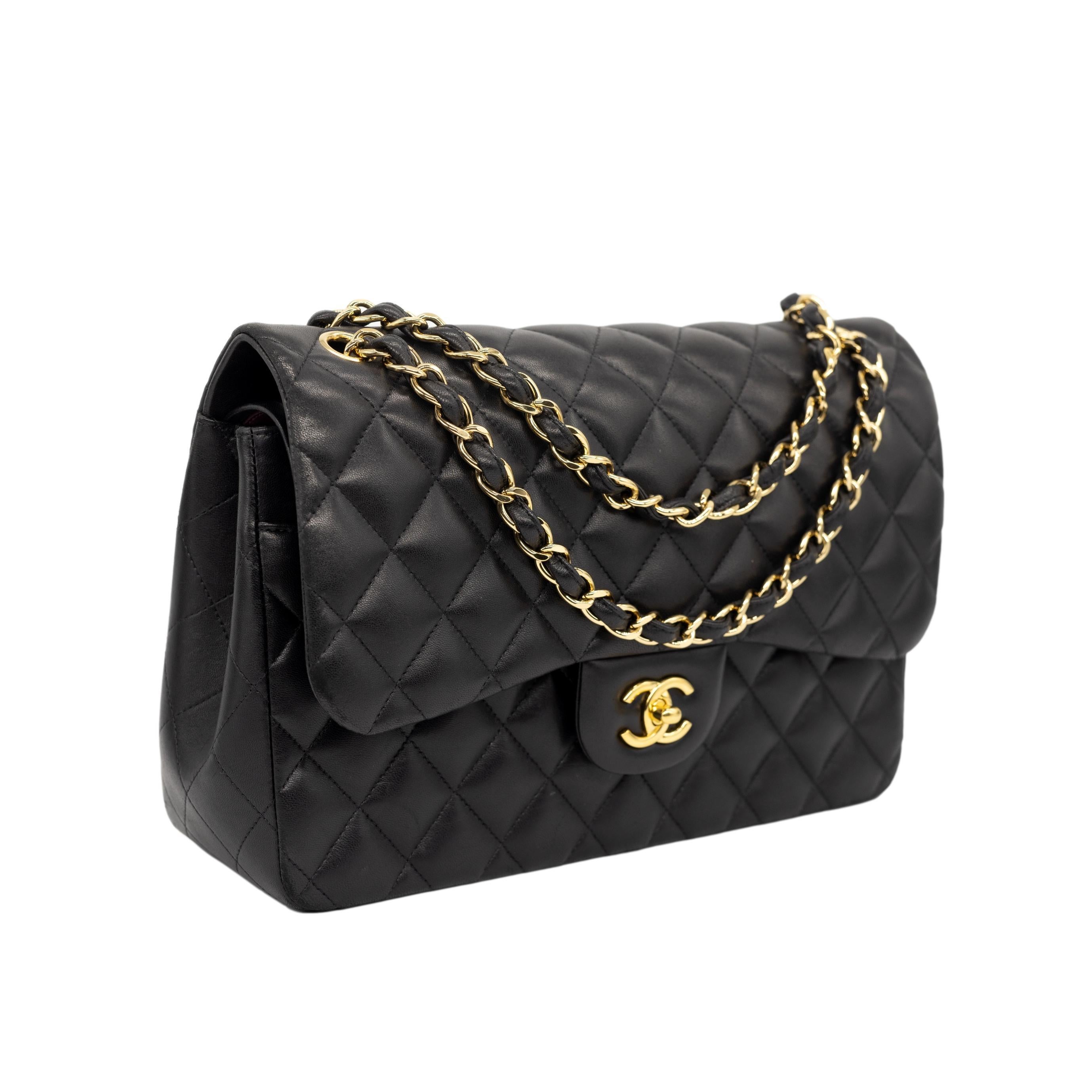 Chanel Timeless Black Jumbo Double Flap Quilted Lambskin Shoulder Bag, 2014. The iconic Chanel bag was originally issued by Coco Chanel in February 1955 which became the very first socially acceptable shoulder bag for the modern day woman of