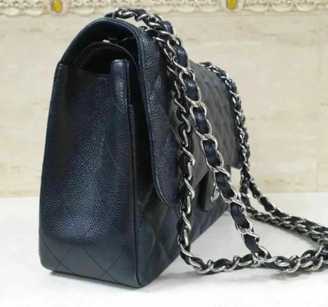  This bag is crafted from leather and features a gold turnlock CC closure and a double flap top.
The multi-functional chain strap may be worn on the shoulder or lengthened for a longer drop. 
A classic and beautiful addition to any collection.
Comes